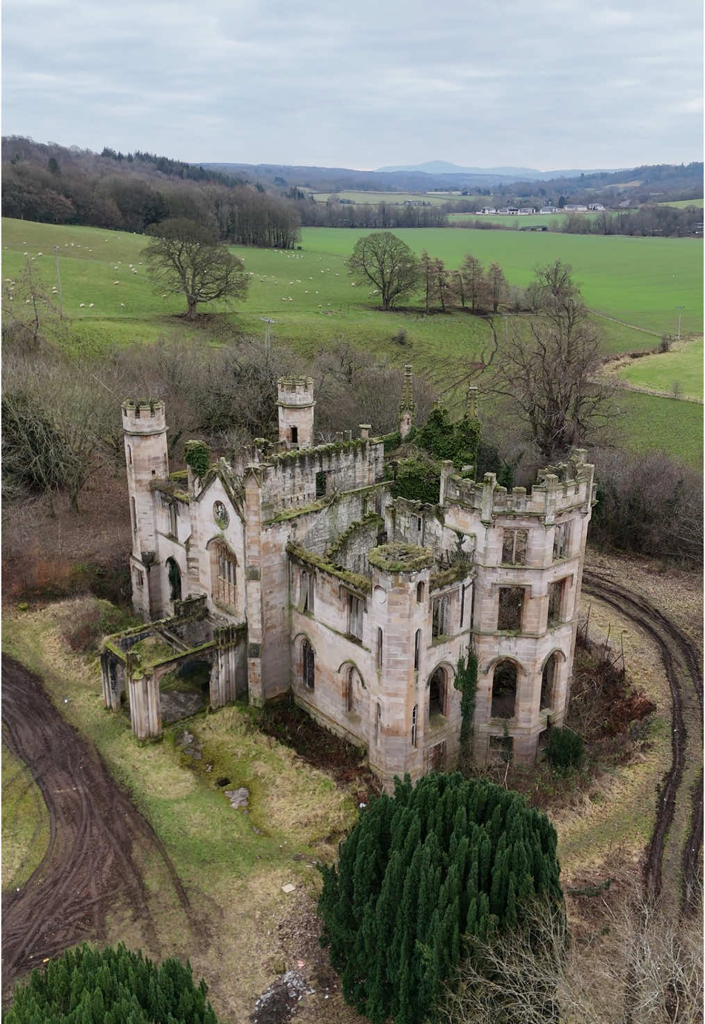 Abandoned Castles in Scotland 🏴󠁧󠁢󠁳󠁣󠁴󠁿 The locations in order as they appear: 1. Lennox Castle was built between 1837 and 1841 in the Norman castle style. In 1987 the castle was vacated and later fell into a state of ruin. 2. Dunalastair House was built in 1859 to a design by Andrew Heiton. During the Second World War, the house was requisitioned and used as a school for Polish children. In the mid 1950s Dunalastair was abandoned following the death of the current owner’s grandmother, and the lead from the roof was stolen in the sixties, leaving the interiors exposed – the reason for the decay of the building to its current condition. 3. Buchanan Castle is the site of an earlier castle, historically owned by Clan Buchanan who are known to have held the estate of their name since at least 1231. In 1850 the original castle burned down and the 4th Duke constructed the current building. After World War II the castle was briefly used as a school, however soon fell into ruin. In 1954, the roof was removed in order to avoid taxes, and the inevitable decline of the building began.  4. Cambusnethan Priory was designed by James Gillespie Graham and completed in 1820. It is generally regarded as being one of the best remaining examples of a Graham-built country house in the quasi-ecclesiastical style of the Gothic revival. Today the building is in a derelict condition, although efforts are being made by the ‘Friends of Cambusnethan Priory‘ to save it from further deterioration. 5. Crawford Priory originally built as Crawford Lodge by the 21st Earl of Crawford in 1758. It was substantially enlarged and extended in the early nineteenth century by a sister of the 22nd Earl, Lady Mary Lindsay Crawford. In 1968 the house was closed, and gradually fell into disrepair and ruin. #Scotland #abandoned #castle #abandonedplaces #haunted #beautiful #hiddengems #explore #scottishtiktok #fyp #moody #travel #gothic #scottish #hauntedhouse #ruins 