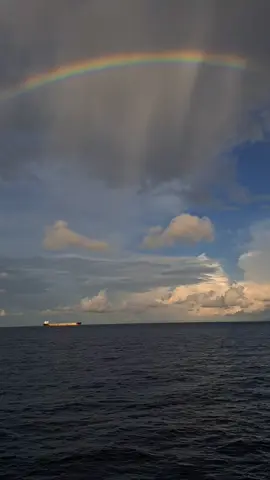 The beauty of a rainbow after the rain at sea #rainbow #sea 