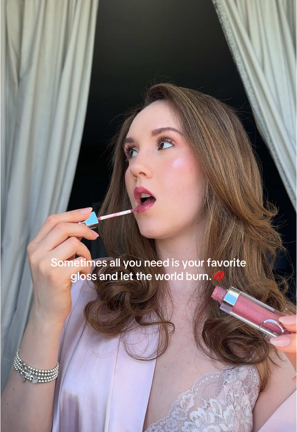 Sometimes it’s just gloss, confidence, and letting the world burn in the background.