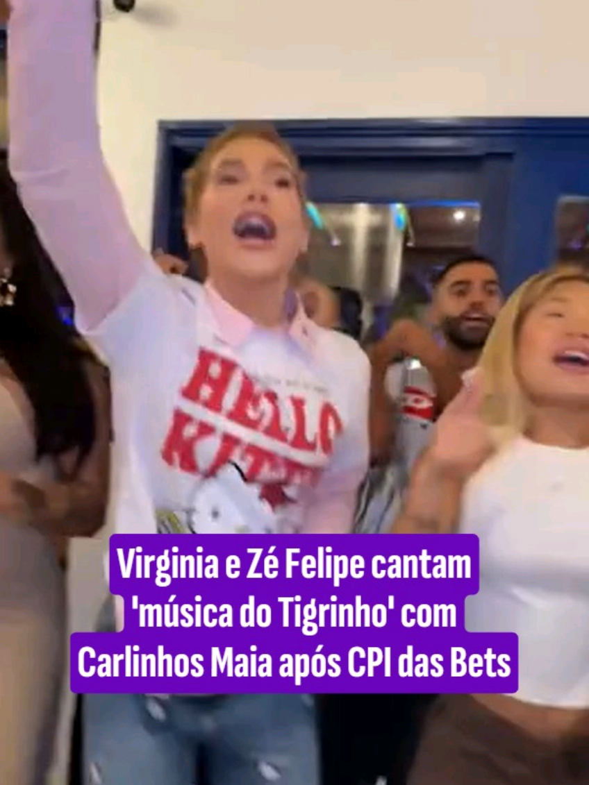 Carlinhos Maia compartilhou Virginia e Zé Felipe, no meio de um grupo de pessoas, cantando a música 