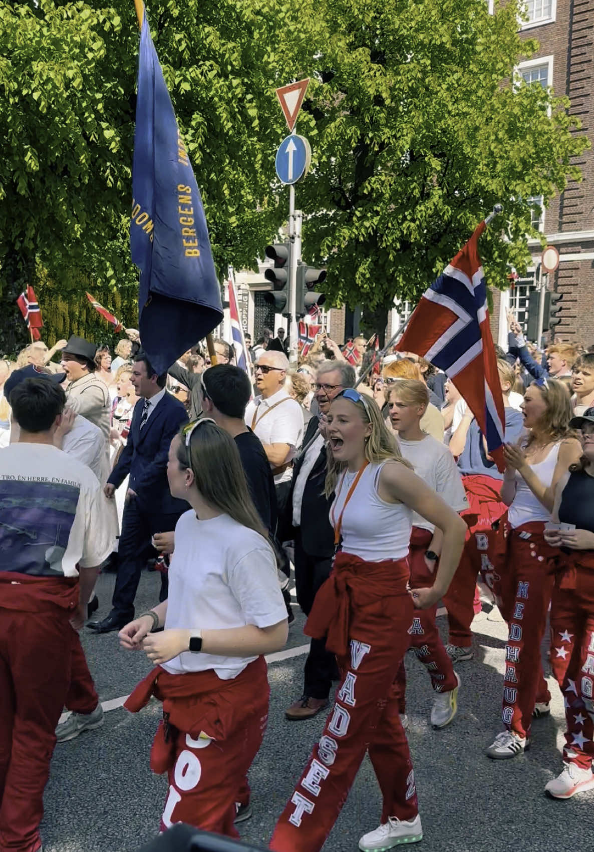 Russefeiring is a long-standing tradition where Norwegian high school students celebrate their upcoming graduation with several weeks of events, fun, and parades. They wear red or blue overalls, depending on their chosen field of study. #17mai #17mai2025🇳🇴 #norge #parade #travel #bergen #people #sevengi1 #russ #russ2025  #celebration #StreetStyle #norway 