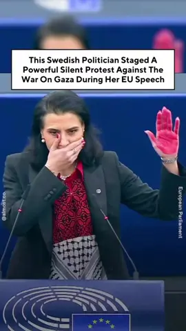 A Swedish member of the European Parliament held a powerful silent protest at an EU parliamentary session to protest Israel’s war on Gaza. 47-year-old Abir Al-Sahlani, who was born in Iraq, spent most of her allotted speaking time in February 2024 with one hand over her mouth and holding up the other hand, which was painted red. She then addressed the EU Parliament in Strasbourg, France, saying, “there are no more words to speak”. In her speech, Sahlani said that people who stand with Palestine are portrayed as “anti-semites” to “make it possible to kill more Palestinians.” “Human rights have a skin color, and the darker you are the less human rights you have,” she added. Sahlani shared a video of her protest on her social media, writing, “Silence is complicity”. This isn’t Sahlani’s first time taking a powerful stand for human rights. In October 2022, she cut off her hair during a speech at the EU assembly in solidarity with anti-government demonstrations in Iran ignited by the death of 22-year-old Mahsa Amini. She then pulled out a pair of scissors and proceeded to cut her hair while uttering the words, “Jin, Jiyan, Azadi,” which is Kurdish for “Woman, Life, Freedom” – a slogan that has come to be associated with the protests, which have spread around the world. More than 52,000 Palestinians have been killed by the ongoing Israeli airstrikes and ground offensive since the beginning of the war on Gaza on Oct. #israel #Gaza #palestine #freepalestine #palestinewillbefree #palestinelivesmatter #gazagenocide 