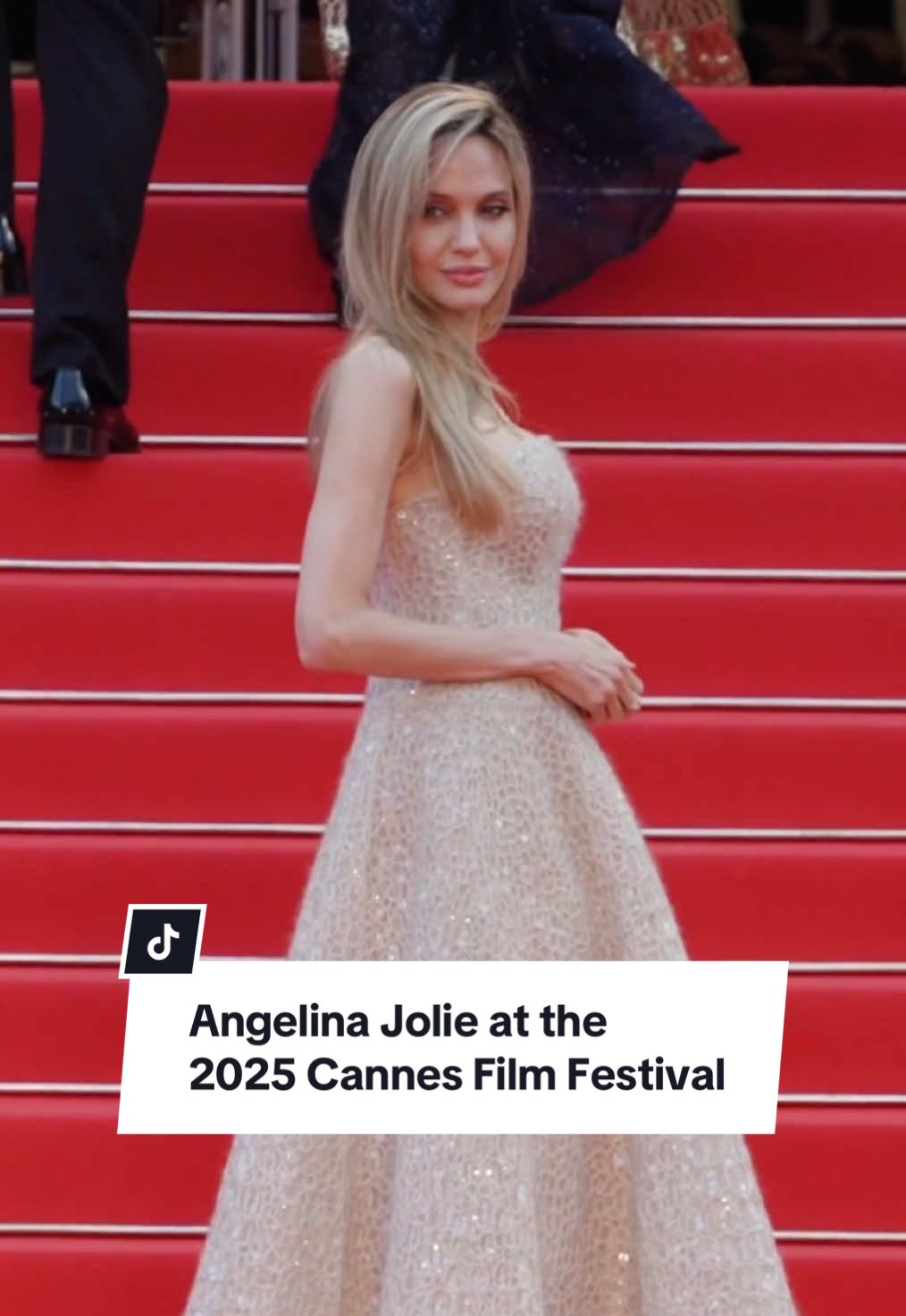 The belle of the ball, #AngelinaJolie, arrived at the 78th annual #CannesFilmFestival, wearing a strapless champagne-coloured gown from #BrunelloCucinelli, for the red-carpet premiere of #Eddington.