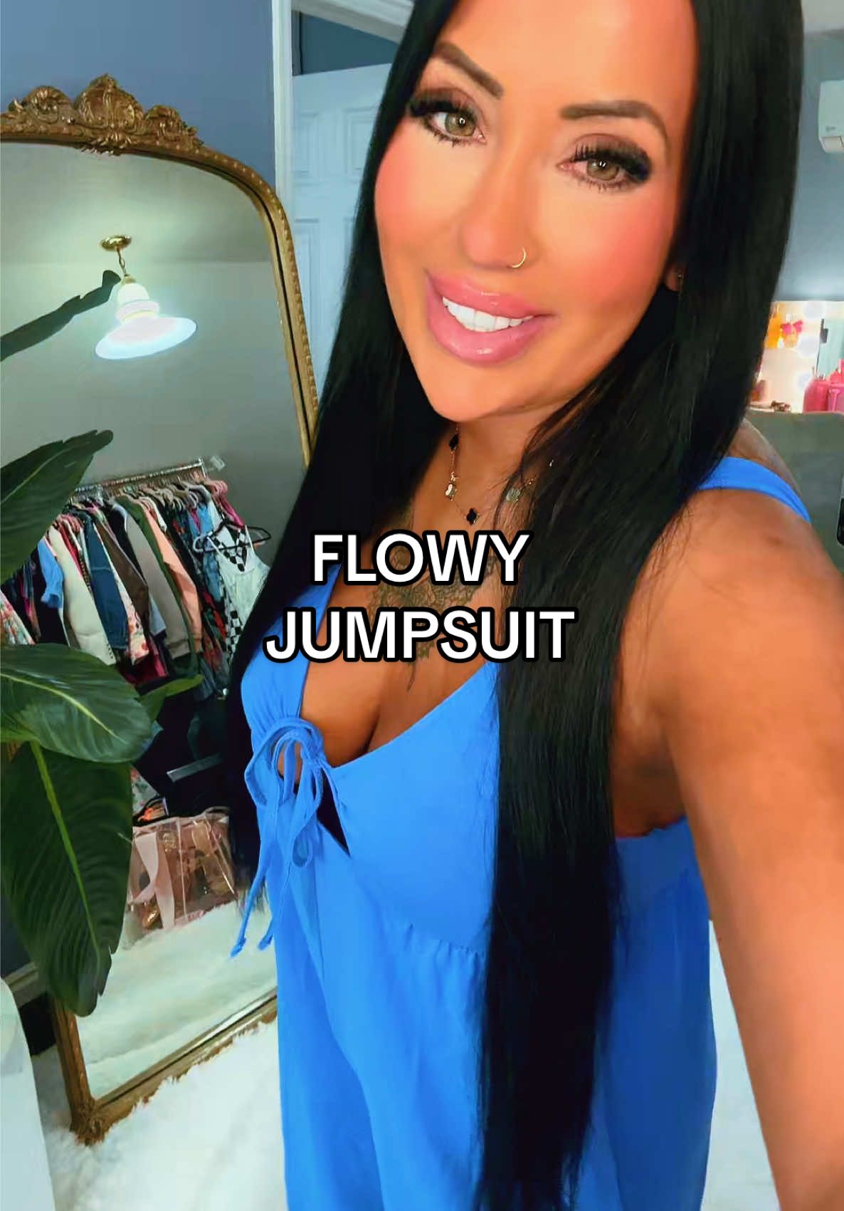 This flowy jumpsuit is breezy, elegant, and effortlessly chic for any summer day. #flowyjumpsuit #easyfashion #summerstyle2025 #chicandcomfy #onepiecewonder 