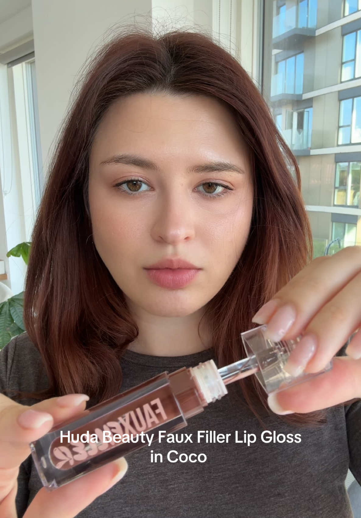 Trying on Huda Beauty Faux Filler Lip Gloss in Coco 🤎 such a pretty colour  #fairskinmakeup @Huda Beauty 