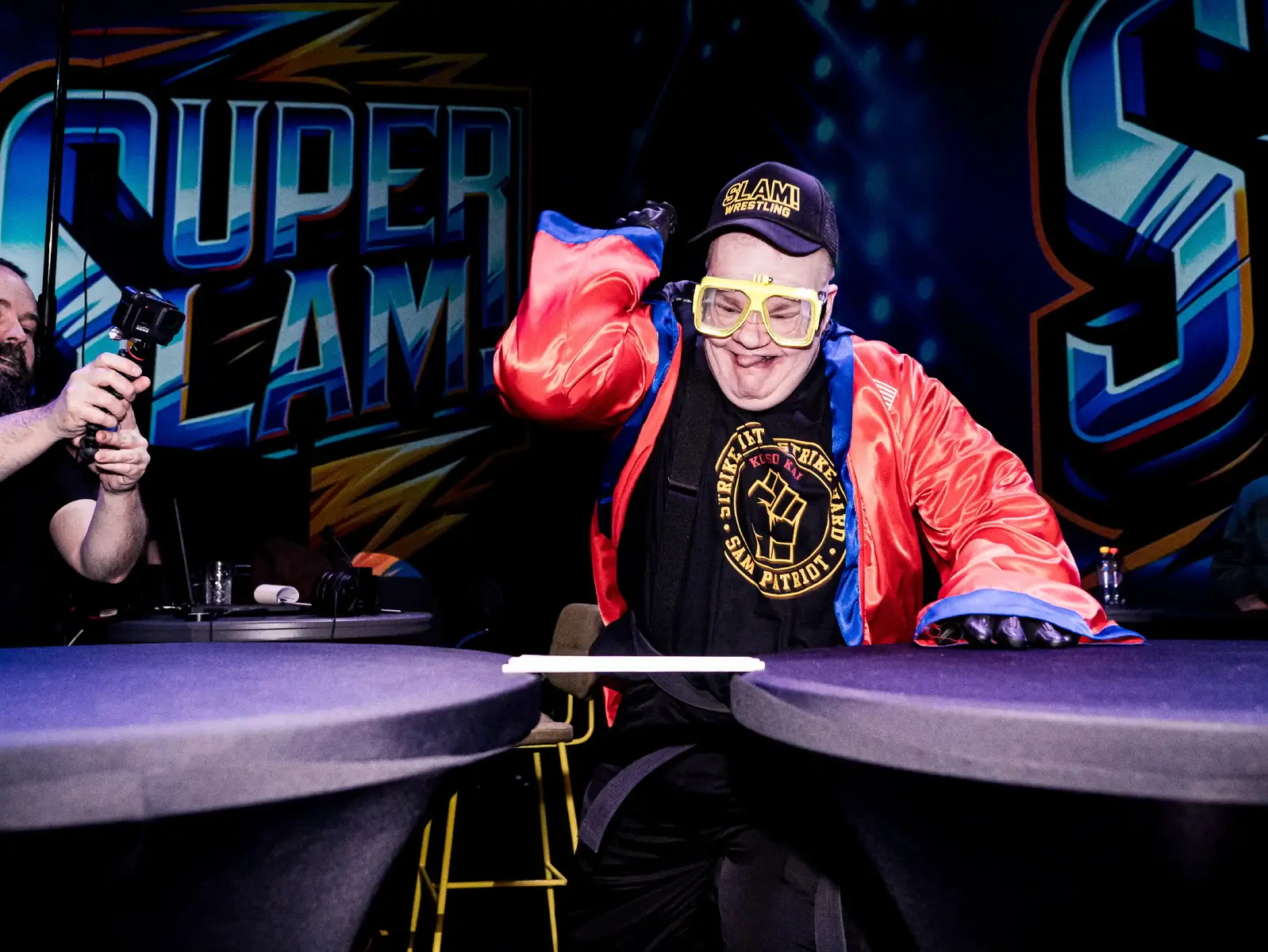Superhero in real life. Punching chopsticks. Photo by Marko Simonen. Event: Super Slam.