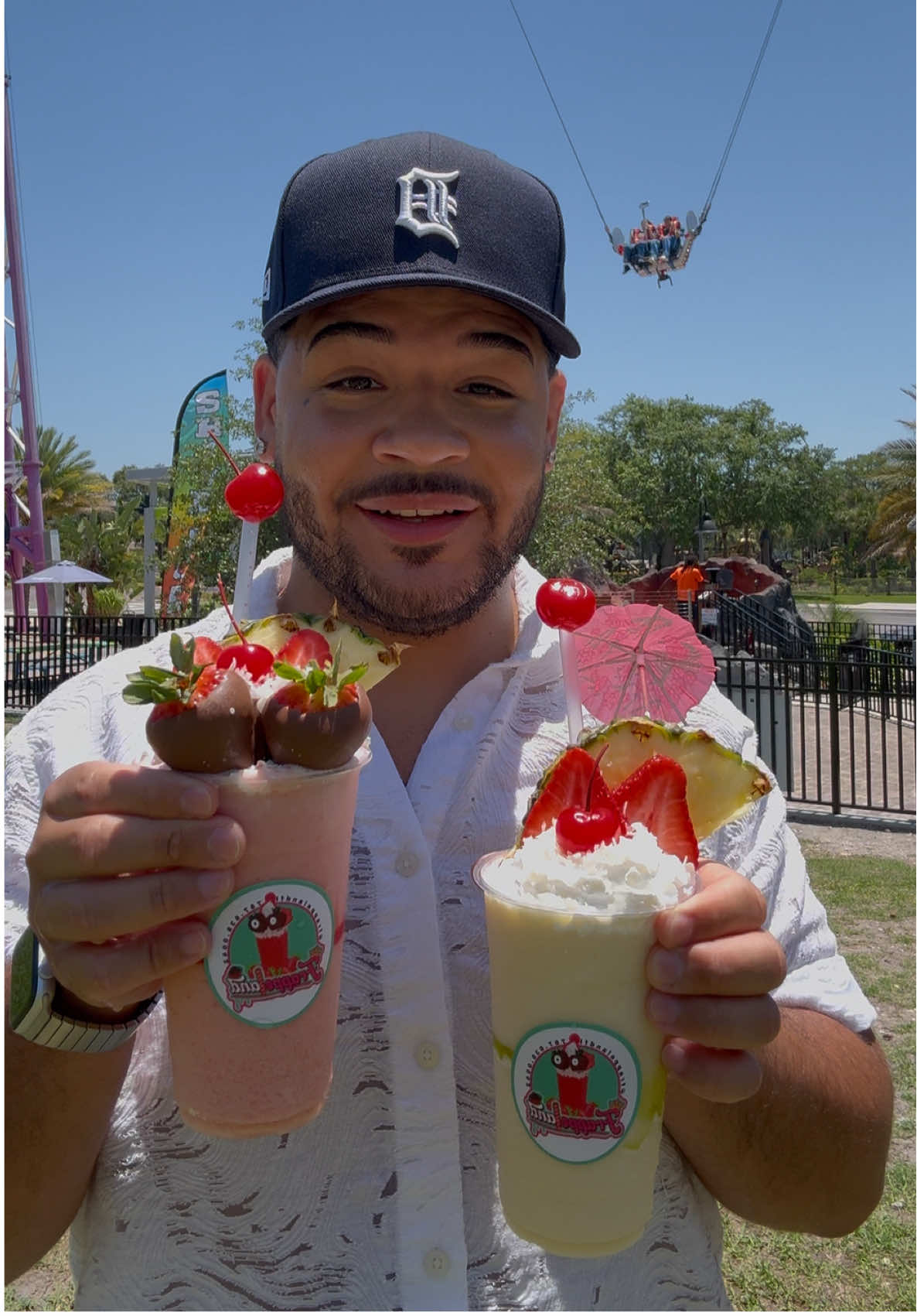 @FRAPPELANDFL AT ICON PARK IS THE SPOT FOR YOUR PERFECT SWEET TREATS & FRAPPES 🍓 🍫 SHOULD I GET ON THE SLINGSHOT?! #frappe #frappes #strawberries #piñacolada #pinacolada #iconpark #orlandofoodie #orlandoflorida #mangonada #tajin #chamoy #peachrings 