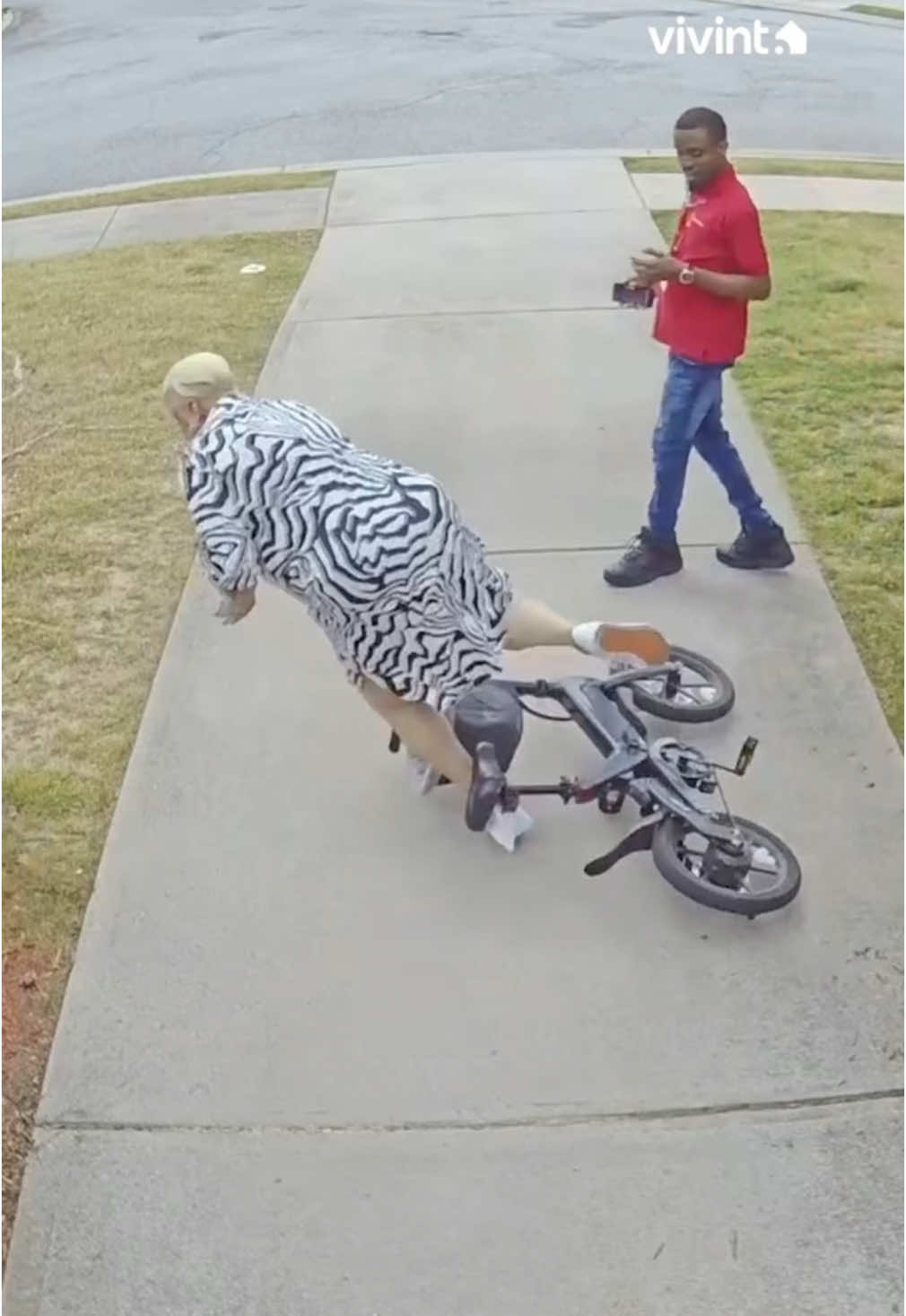 Head over wheels. 🚲 #parents #funnyvideos #funnymoments #parentsoftiktok #caughtoncamera #vivint #fails 