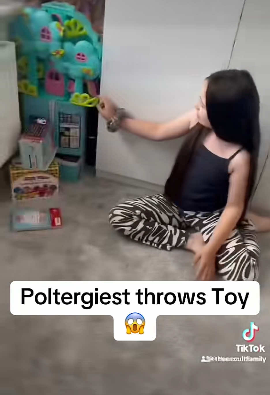 Poltergiest throws a toy across  a haunted house.  Paranormal caught on camera when we went out! This house was empty when a toy was thrown across the room by a spirit or ghost!  (Ps we are so annoyed the toy box is there hiding the first movements of the toy!)  #haunted #hauntedtiktok #hauntedhouse #hauntedplaces #hauntedfamily #scary #spooky #poltergeist #poltergeistactivity #creepytok #foryoupage❤️❤️ #foryouu #fyp #explorepage✨ #caughtoncamera #paranormalcaughtoncamera #insane 