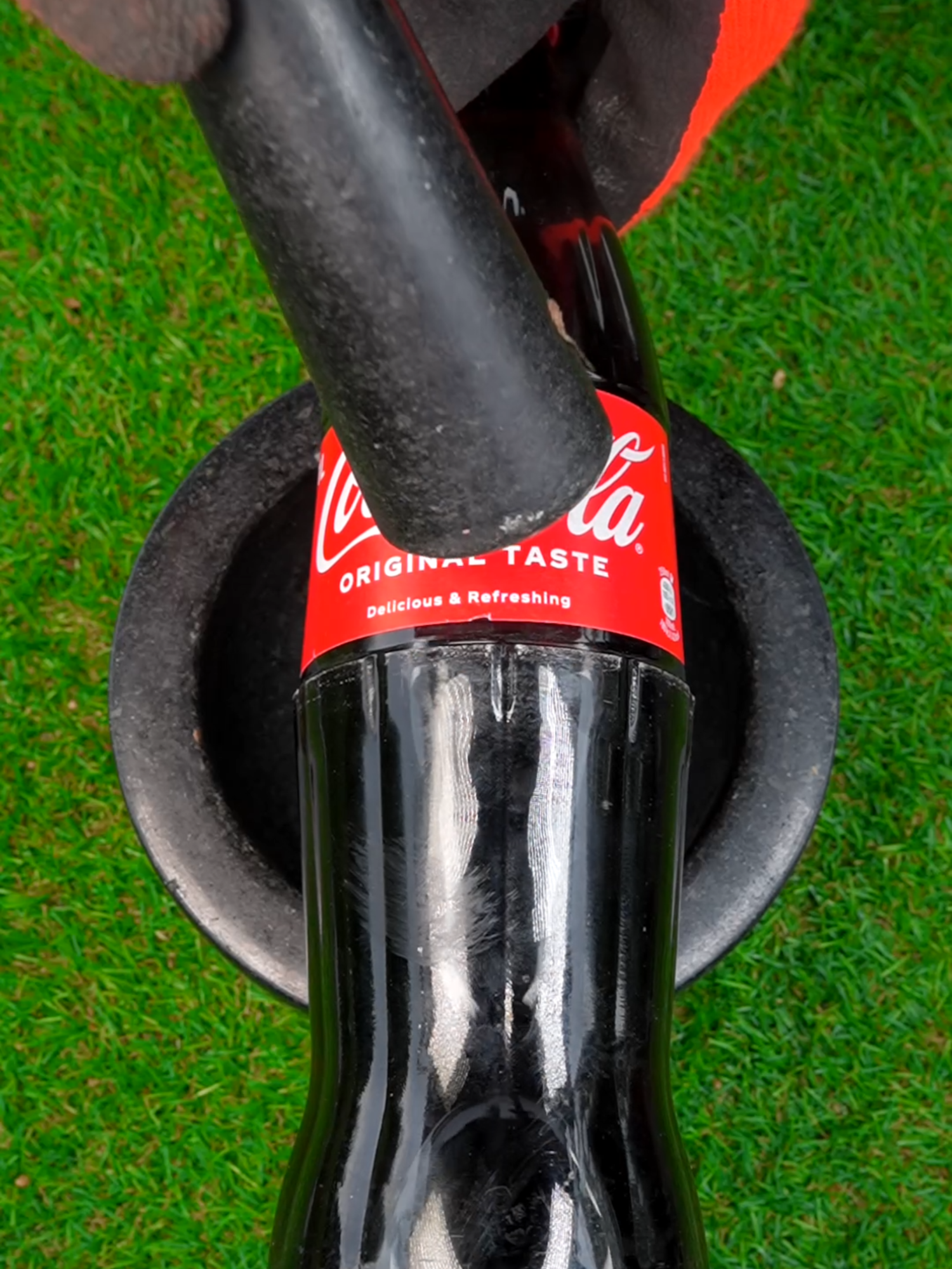 Is it possible to crush a coca cola bottle? 😳