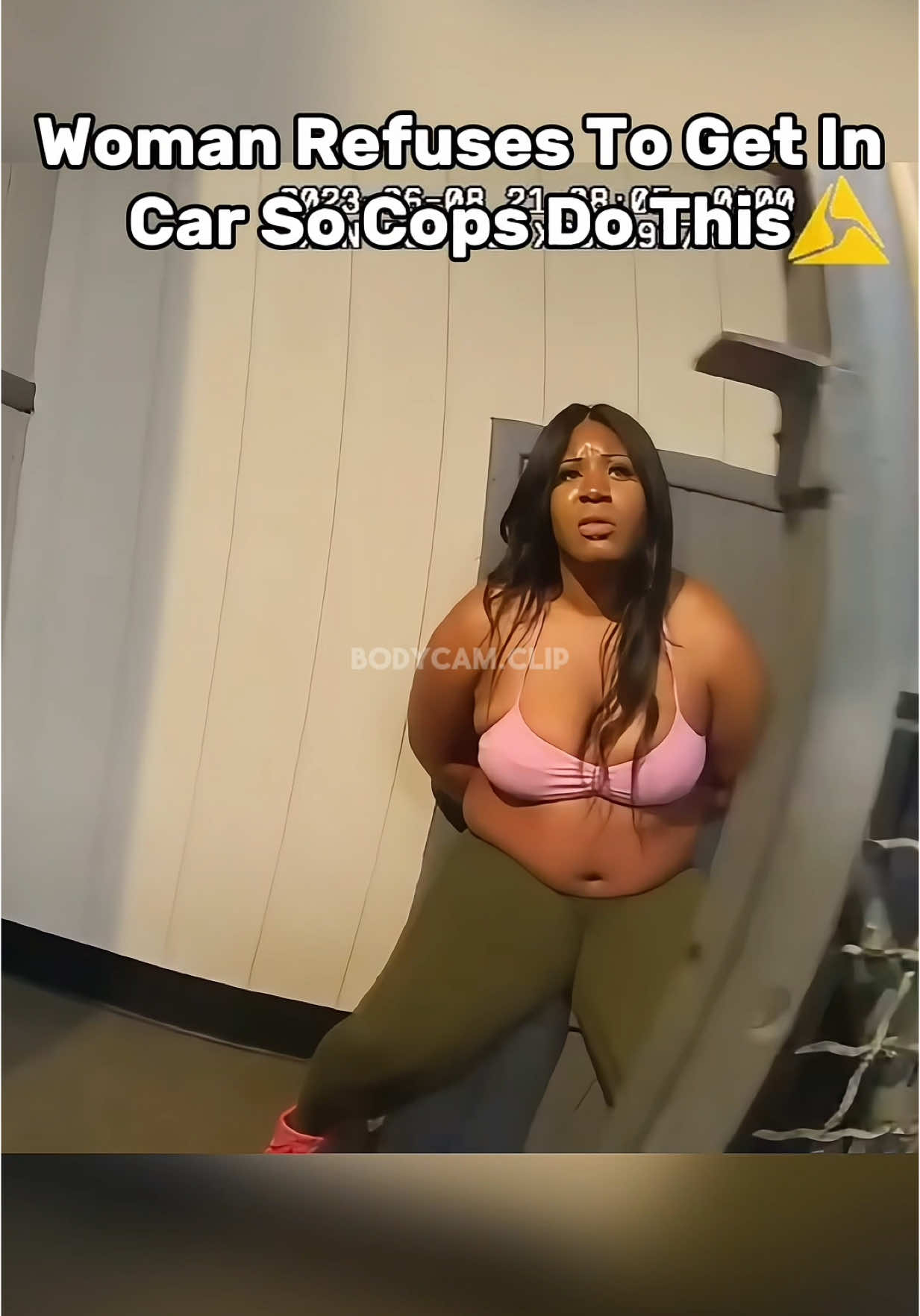 After a woman refuses to get into a cop car, officers resort to calling the ambulance to get her strapped down to a bed. Was this a good idea? #bodycamera #fypツ #policevideos 