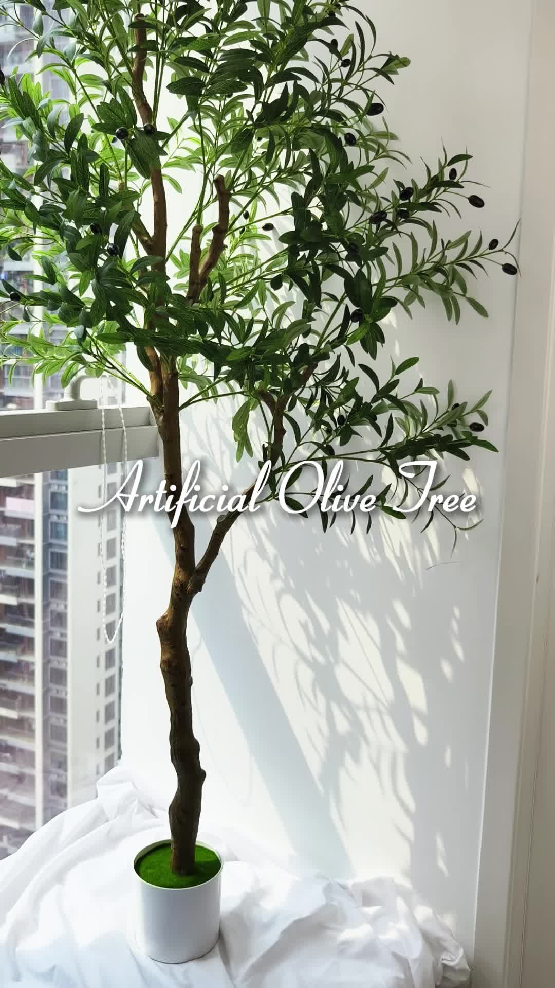 Add a touch of green without the upkeep 🌿This artificial olive tree instantly elevates your space #oliveTreeDecor #homedecor #aestheticroom #artificialplants #plantvibes #interiorstyling #fyp #decorinspo #minimalistdecor #bohovibes #greentouches