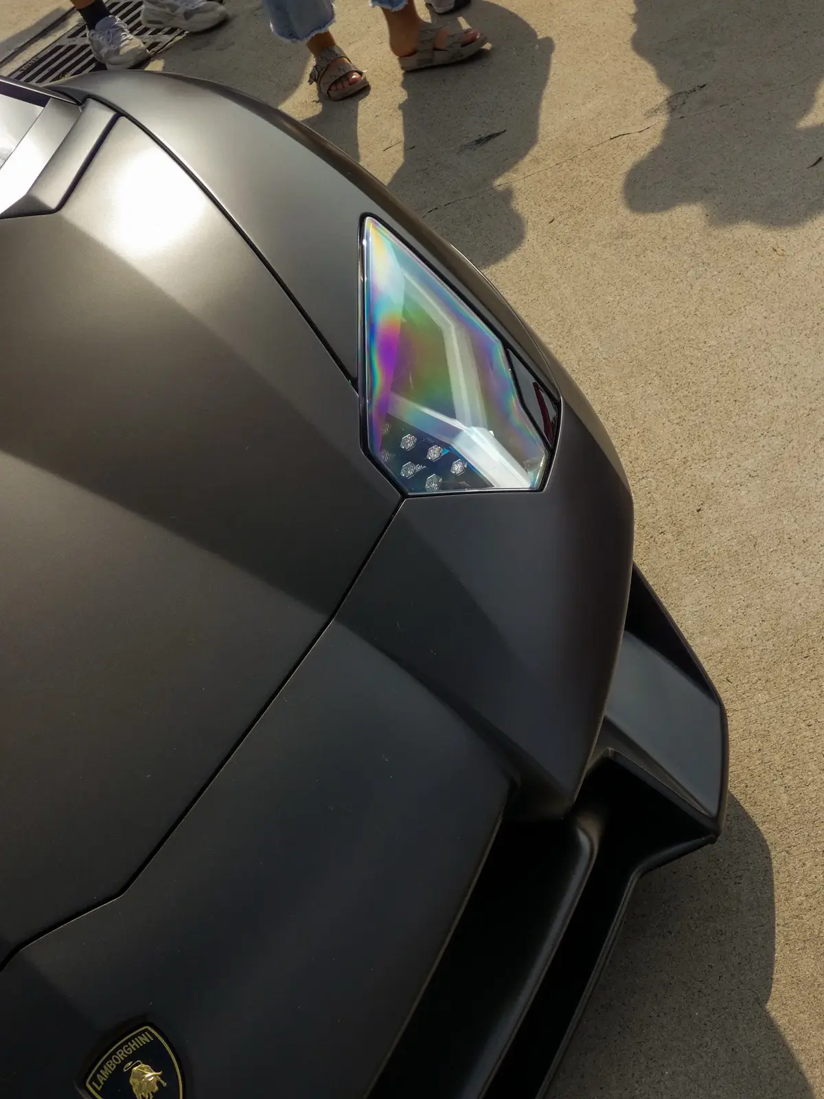 The Lamborghini Aventador SV is a high-performance sports car that embodies the brand's commitment to exceptional design, innovative technology, and exhilarating driving experiences. Here's a description of this remarkable vehicle: # Exterior The Aventador SV's exterior design is a masterclass in aggressive styling and aerodynamic efficiency: - *Sharp lines and angles*: The car's design features sharp lines and angles, creating a sense of dynamic movement and aggression. - *Carbon fiber and ALA*: The Aventador SV features extensive use of carbon fiber and Lamborghini's Aerodinamica Lamborghini Attiva (ALA) system, which optimizes airflow and downforce. - *LED headlights*: The car features distinctive LED headlights that add to its aggressive and futuristic appearance. # Interior The Aventador SV's interior is designed to provide an immersive driving experience: - *Luxurious materials*: The interior features high-quality materials, including leather and Alcantara trim, providing a luxurious and sporty ambiance. - *Driver-focused design*: The interior is designed to provide an engaging driving experience, with a range of features such as a digital instrument cluster and a sporty steering wheel. - *Infotainment system*: The car features a range of advanced infotainment and connectivity options, including navigation, Bluetooth, and Apple CarPlay. # Performance The Aventador SV is powered by a range of advanced technologies: - 6.5-liter V12 engine: The Aventador SV is powered by a 6.5-liter V12 engine, producing 740 horsepower and 509 lb-ft of torque in the SVJ variant. - *7-speed ISR transmission*: The car features a 7-speed Independent Shifting Rods (ISR) transmission, providing rapid gearshifts and optimal performance. - *All-wheel drive*: The Aventador SV features Lamborghini's all-wheel-drive system, providing exceptional traction and stability. # Specifications Some key specifications for the Lamborghini Aventador SV include: - *0-100km/h*: 2.8 seconds (SV), 2.8 seconds (SVJ) - *Top speed*: Over 350km/h (217mph) - *Power-to-weight ratio*: 1.98 kg/PS (SVJ) - *Downforce*: Up to 488 kg (1,076 lbs) at 250 km/h (SVJ) The Lamborghini Aventador SV is a testament to the brand's commitment to innovation, design, and performance, offering an unparalleled driving experience for enthusiasts.