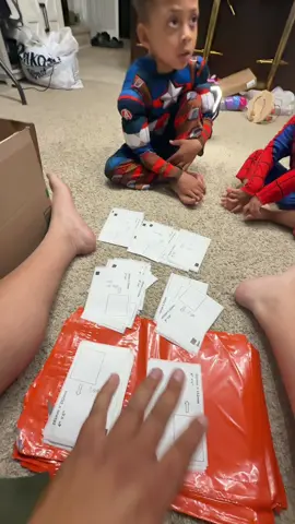 The boys wanted to help pack and ship orders this morning 