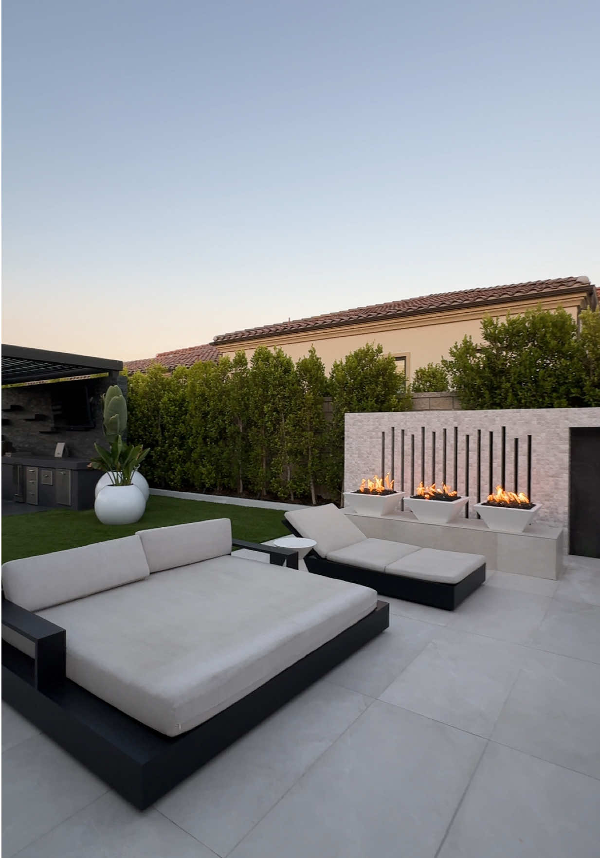 Backyard goals? Unlocked. This outdoor kitchen + BBQ zone was made for unforgettable summer nights. Luxury, style, and function all in one space . . . #BackyardInspo #OutdoorKitchenGoals #LuxuryLandscaping #BBQSetup #DreamBackyard #ModernPatio #AlfrescoLiving #OutdoorEntertainment #BackyardVibes #PoolsidePerfection #CustomLandscaping #LandscapeDesign #BBQLife #BackyardUpgrade #HomeGoals 
