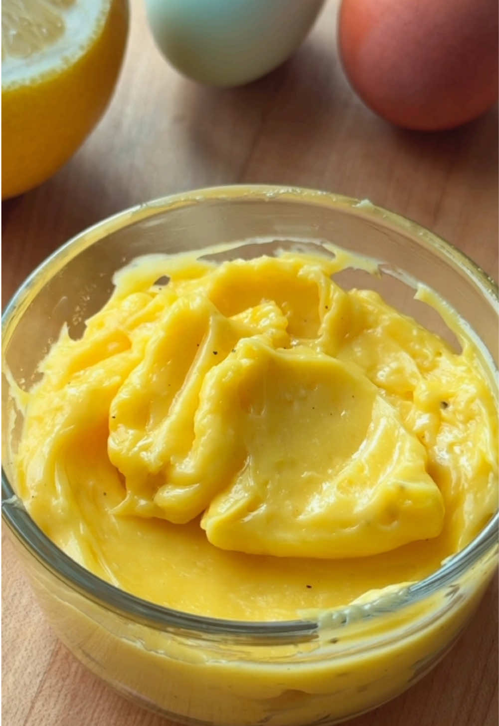 Welcome to my Vietnamese Banh Mi Series, which I will show you how to make my favorite components of Vietnamese Banh Mi!  Today I’m making  Viet Style Mayonnaise from scratch.  Because it’s only made with egg yolk, it is on the richer side.  It’s great not only for Banh Mi but also can be a dip for steak and grilled veggies.  Hope you will try, recipe and tips for success below!  Tips: 1.  Use room temperature eggs 2.  You can use a hand mixer, stand mixer, emulsion blender, or even a hand whisk (will take longer) 3.  Add oil slowly, you have a better chance of a smooth and thick consistency.  4.  Acid like lime or lemon juice help start the emulsion 5.  You can add different spices to your mayo to your liking.  I like the classic salt, pepper, and sugar.  2 egg yolks 1 cup of neutral oil  Juice of 1/2 lemon  1/2 tsp salt 1/2 tsp black pepper  1-2 tsp sugar to your liking  Minced garlic (optional)  1.  Set eggs out to reach room temp.  Separate the egg white and just use the yolks.  2.  In a mixing bowl add the yolk and lemon juice.  Slowly add the neutral oil as you beat the egg yolk.  Yolks will emulsify into a creamy and smooth consistency. Once all the oil is added, season with salt, black pepper, sugar, and minced garlic.  3.  Store in the fridge for up to 5 days. #fyp #fypシ #vietnamesefood #Love #mayo