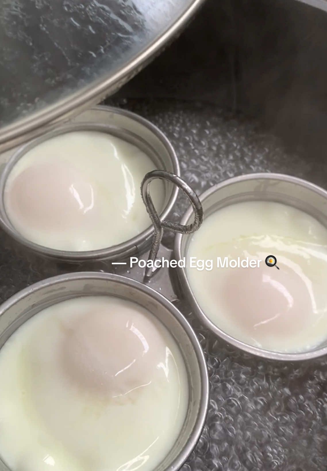 You can skip the oil when cooking your eggs! Instead, try using water for a healthier alternative. 🍳🫶 #poachedegg #poachedeggmold #fyp 