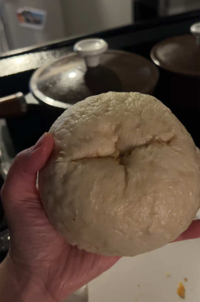 My girlfriend ate the siopao with paper. Make sure you peel your siopao paper at the bottom, folks 😩🤣🇵🇭 #siopao #filipinosnacks #wlwcouple 