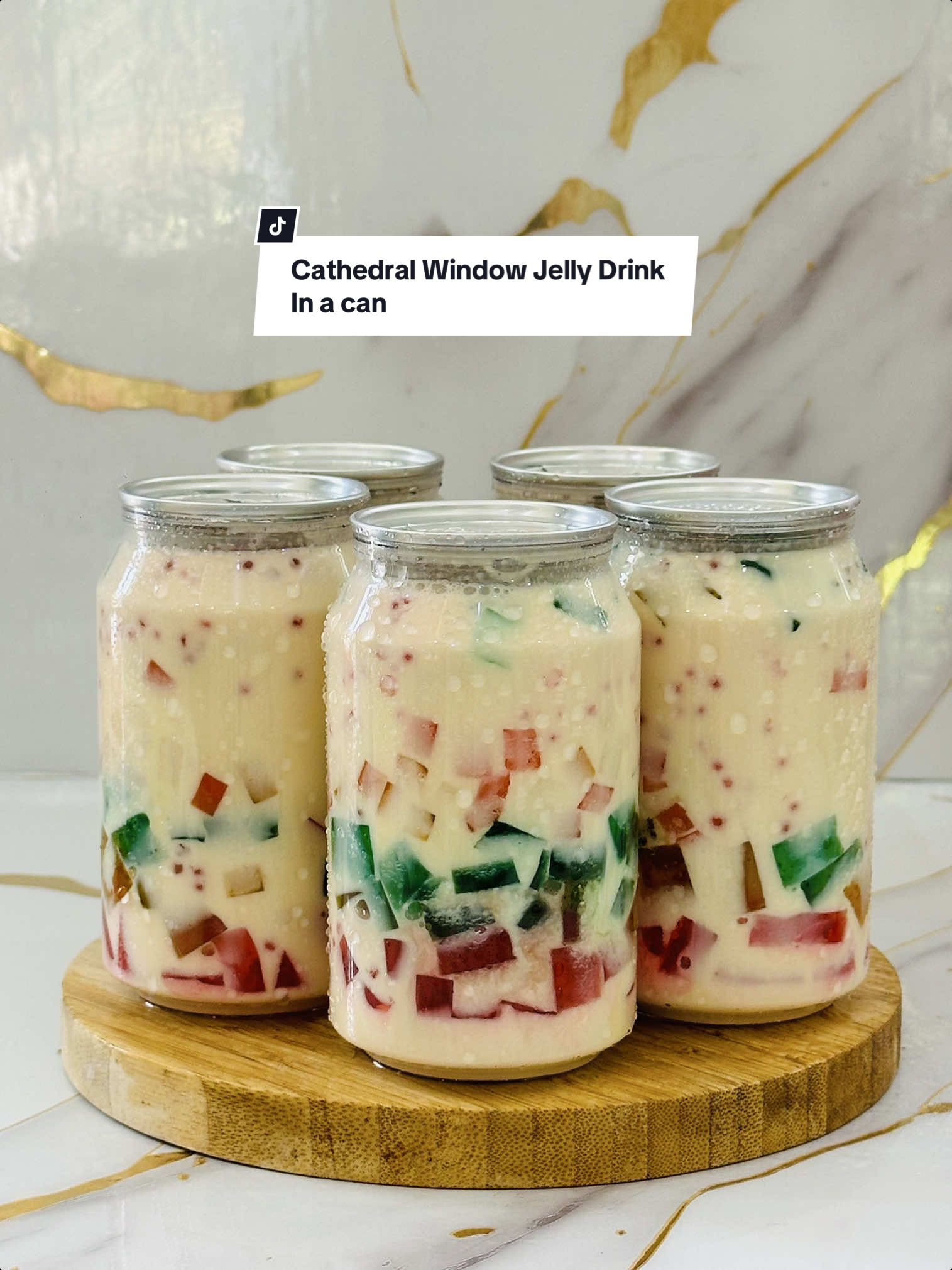 Cathedral Window Jelly Drink Ingredients: Rainbow Jelly Sago •1/3 cup sago •water for boiling •red food color Jelly •1pack Megalicious Mr. Gulaman Clear Jelly Powder •1/3 cup sugar •1 liter water •Food coloring: Red, Green and Yellow Cream Mixture: •700ml Evaporated Milk or Fresh Milk •390g Condensed Milk •250ml All purpose Cream Refrigerate then serve! #EasyRecipe #dessert #drink #jellydrink 