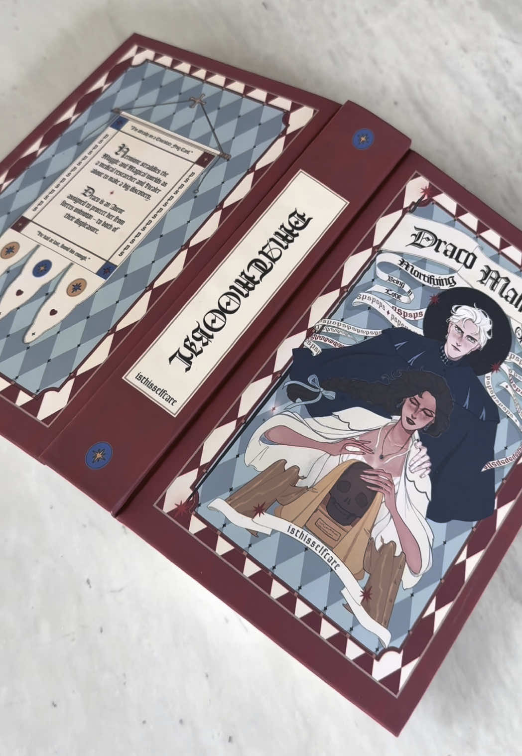 𝐦𝐚𝐤𝐢𝐧𝐠 𝐟𝐚𝐧𝐟𝐢𝐜𝐭𝐢𝐨𝐧 𝐢𝐧𝐭𝐨 𝐚 𝐡𝐚𝐫𝐝𝐜𝐨𝐯𝐞𝐫 𝐛𝐨𝐨𝐤 🪡  Draco Malfoy and the mortifying ordeal of being in love is free to read on #ao3 - Art by the wonderful ellemisc on ig  #dramionefanfiction #dramione #dracomalfoyandthemortifyingordeal #handmadebooks #bookbinding #bookbindersoftiktok #fanfiction #fanfic #fanficrecomendations #bookbindingathome #BookTok #dramionetok 