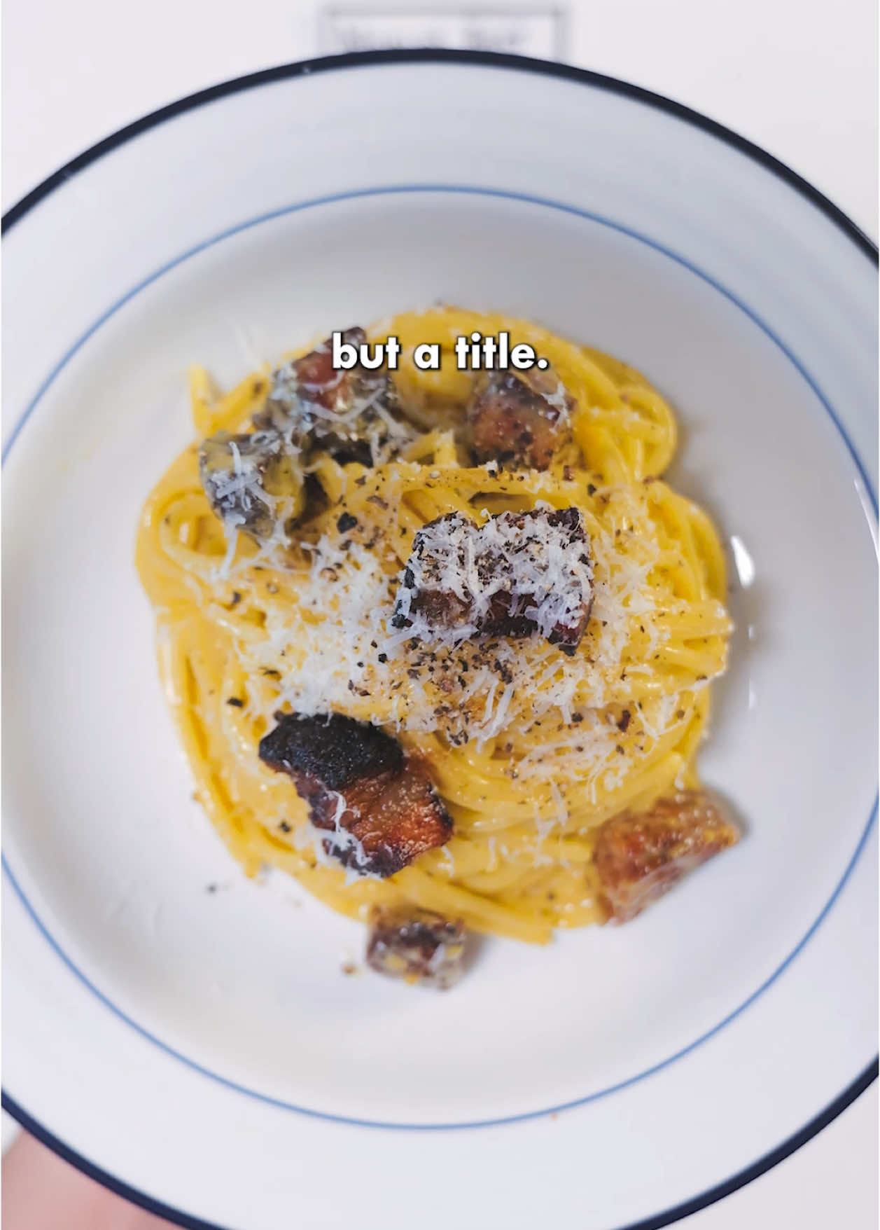 Recreating the World’s Best Carbonara #cooking #foodtiktok #food #Recipe #pasta #carbonara  Ingredients - 4 egg yolks - 200g guanciale (cut into cubes or strips) - 20g pecorino romano - 30g grana padano - 6g whole Sarawak black peppercorns - 280g dried spaghettoni  Instructions - Toast peppercorns until fragrant (don’t let them burn!) then coarsely grind and save 2g for later - Heat a pot of water for the pasta, try to use just enough water to cover the pasta (to concentrate the starch, which will help in emulsification)  - Add 4 egg yolks, the grated cheeses, and the saved 2g of black pepper to a metal bowl and whisk (it’ll be clumpy) - Place the meal bowl on top of the heated pot of water and whisk until the color and density changes (should become smooth) - Add the guanciale to a cold pan (without oil) and cook over low-medium heat until the fat renders. Remove the guanciale and save the fat.  - Start cooking the spaghettoni until very al dente  - Add the cooked pasta to the metal bowl with the egg/cheese mix and add 2-4 spoonfuls of the guanciale fat, along with enough pasta water to emulsify and achieve the desired consistency (start with half a cup and add more as needed) - Mix vigorously to emulsify then add in the guanciale (if the sauce is too loose, just place it back on top of the heated pot of water to thicken)  - Serve with grated pecorino romano and a few pinches of the freshly ground black pepper 