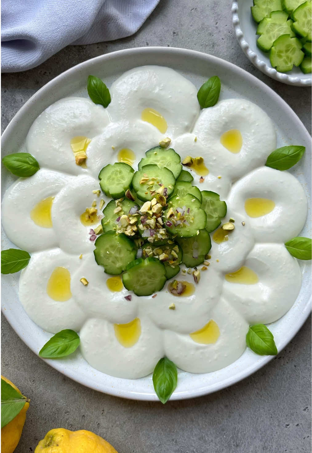 Feta Cheese Dip  with cucumber, red onion, pistachio, olive oil, and lemon juice. Get the recipe on my website (link in bio) or google ‘foodbites feta cheese dip’.   Serve this platter with pita bread, crackers, or veggie sticks.  #feta #dip #appetizers #EasyRecipes #dinnerparty #appetizer #fyp #platters #sidedish #dips