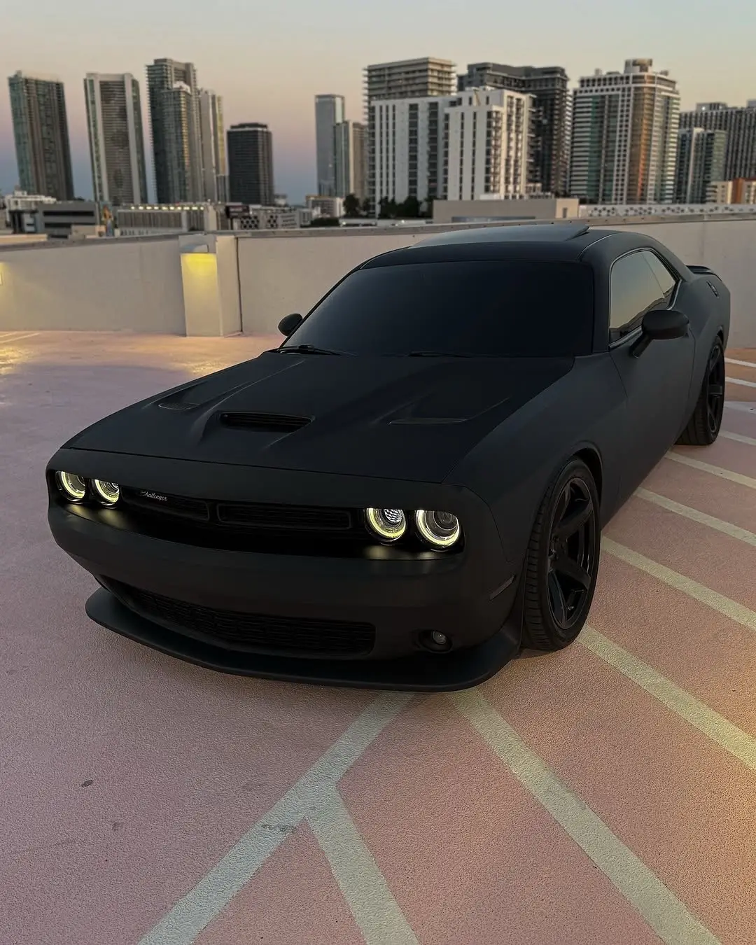 DEMON 💀 Dodge Challenger SRT Demon is a limited-edition, street-legal drag car built for extreme performance. It packs a 6.2L supercharged HEMI V8 making up to 840 hp and 770 lb-ft of torque, doing 0–60 mph in just 2.3 seconds and the quarter mile in 9.65 seconds. It features drag-specific tech like TransBrake, Line Lock, and Drag Mode, and was the first production car to do a wheelie off the line. Only 3,300 units were made, making it a rare and legendary American muscle car. #dodge #challenger #SRT #Demon #Car #cars 