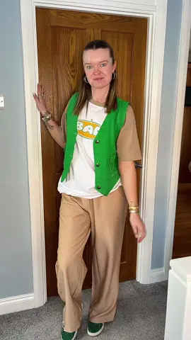 Outfit Details💚🍀 Waistcoat: @TK Maxx  T-shirt: TKMAXX - Bad Handwriting Trousers: @asos  Trainers: @adidas  Earrings: TKMAXX Bracelet: TKMAXX  #OOTD #outfitoftheday #style #whatiworetoday #workoutfit #fashiontiktok #stylinginspo #fashion #fyp #foryoupage #viral 