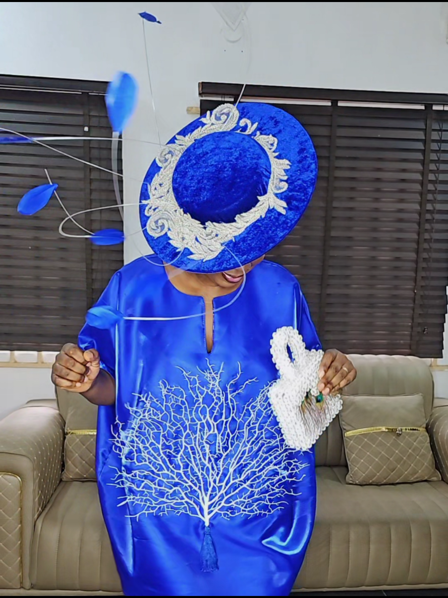 I made the gown y'all💃💃💃 I needed a blue dress to showcase this beautiful boater fascinator, so I got on my sewing machine and made this simple gown as I am still learning how to sew😊😊😊 Our stylish and beautiful fascinator is readily available for delivery. The beaded bag and artificial tree used on the dress are also available ❤️❤️❤️ FASCINATOR:N50,000 #creatorsearchinsight #creatorsearchinsights #fashion #millinery #fascinator #hats #celebritystyle #fyp #fypシ゚ #handmade #wedding #weddingday #bluefascinator #Lagos #lagostiktok #lagosweddings 
