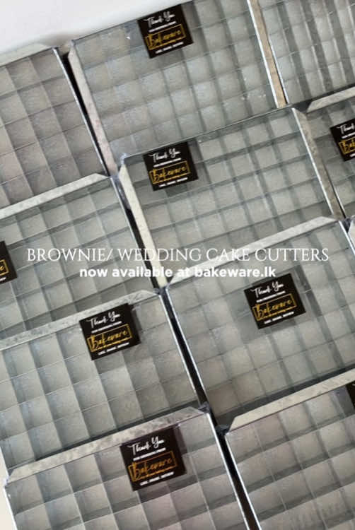 Perfectly Cut Every Time – 2”x2” Brownie & Wedding Cake Cutter Tray (10”x10”) – Uniform Elegance for Every Occasion! Uniform Sizing: Each cavity is exactly 2”x2”, ensuring perfectly portioned brownies or mini cake slices—ideal for weddings, parties, or professional displays. Time-Saving: No more measuring or uneven cuts—just bake and lift for consistently flawless results. Professional Finish: Great for bakers, caterers, and dessert businesses aiming for clean presentation and customer satisfaction. Durable & Reusable: Built from quality material for repeated use, saving money and reducing waste compared to disposable options. Multipurpose: Works beautifully for brownies, fudge, cheesecake bites, petit fours, or any square dessert. #bakewarelk #srilanka #bakeware #fyp #fypシ #bakersoftiktok #viral #baking #baker #chocolate #chef #BAKEWARElk #dessert ##dessertchallenge #desserttiktok #acrylicdessertcups #acryliccups #nikkah #wedding #dessertshop #brownie #brownies #browniecutter #browniebites #brownierecipe #weddingcakecutter #srilankanwedding #weddingfavors 