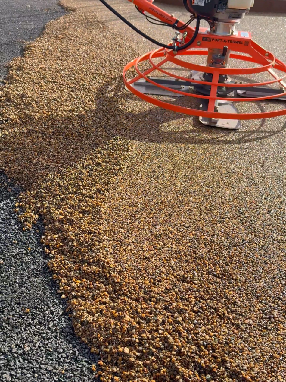 MBW Port A Trowel giving that smooth flawless finish on the Resin Bound Surfacing. #resin #resinbound #paving #landscaping #garden #tools #powerfloat #construction #fyp 