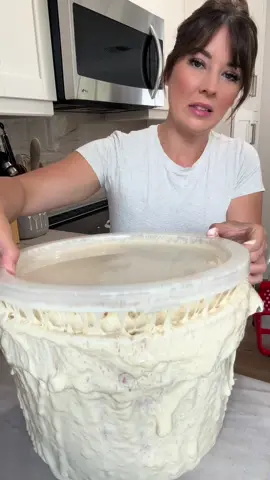 NOT SOUR-SOURDOUGH LOAF 🍞  *Free sourdough starter guide in my linc tree* 500g bread flour  335g water (lukewarm) 175g sourdough starter (use starter at peak) 10g honey or sugar (optional to help reduce tang) 10g salt Mix Dough: Combine all ingredients in a large bowl. Mix by hand or stand mixer until everything is well incorporated.  Stretch & Fold: Perform 3 sets of stretch and folds every 20-30 minutes. Bulk Fermentation time starts when the dough is first mixed. Since there is more starter in this recipe, bulk fermentation time is going to be faster. (3–4 hours at 75–78F or 2-2.5 hours if around 80-82F) Shape & Proof: Shape into a boule or batard. Place into a floured proofing basket or bowl lined with a floured towel or paper towel.  Second rise: You have two options for this, you can leave on the counter for another hour, it’s going to be harder to score if you do this. So I recommend the second option. Throw in the fridge for only 3-4 hours. Letting the dough chill will firm it up making it easier to score. You can let it sit overnight but keep in mind if you do that it will make the taste more tangy.  When ready to bake:  Preheat your oven to 450F, once done, let your Dutch oven preheat for a minimum of 20 mins.  Lay your loaf on a sheet of parchment paper, score the loaf and then lower into the Dutch oven. With the lid on, bake in oven for 20 mins. Then remove lid and bake for another 20 mins or until desired color. Internal temp needs to be 200F to be baked through.  Let cool for a minimum of 1 hour before cutting into 🔪 and enjoy! 😋 Tips for controlling the tang on your sourdough:  -More starter means a faster fermentation time and less sour taste. Less starter means more sour and longer fermentation time.  -Adding whole wheat or other whole grains will give your loaf a tangier taste. Which is why this recipe doesn’t call for that. -Adding honey or sugar mellows out the acidity giving a less tangy taste. -Using starter right at peak will make a less sour loaf. If you want a tangier loaf, try using past peak starter. -Overnight proofing extends the time your loaf is fermenting so if you want more tangy try to extend the cold proof in the fridge longer. Less time for less tang.  -I feel like I am missing some, let me know if I did in the comments and if you prefer a more or less tangy sourdough loaf 😋 Two things to note: if you want that slow fermented sourdough chocolate muffin recipe @petalandproof has it and a ton of others to try I highly recommend! And @Chosen Foods avocado oil is choice 🤌😋