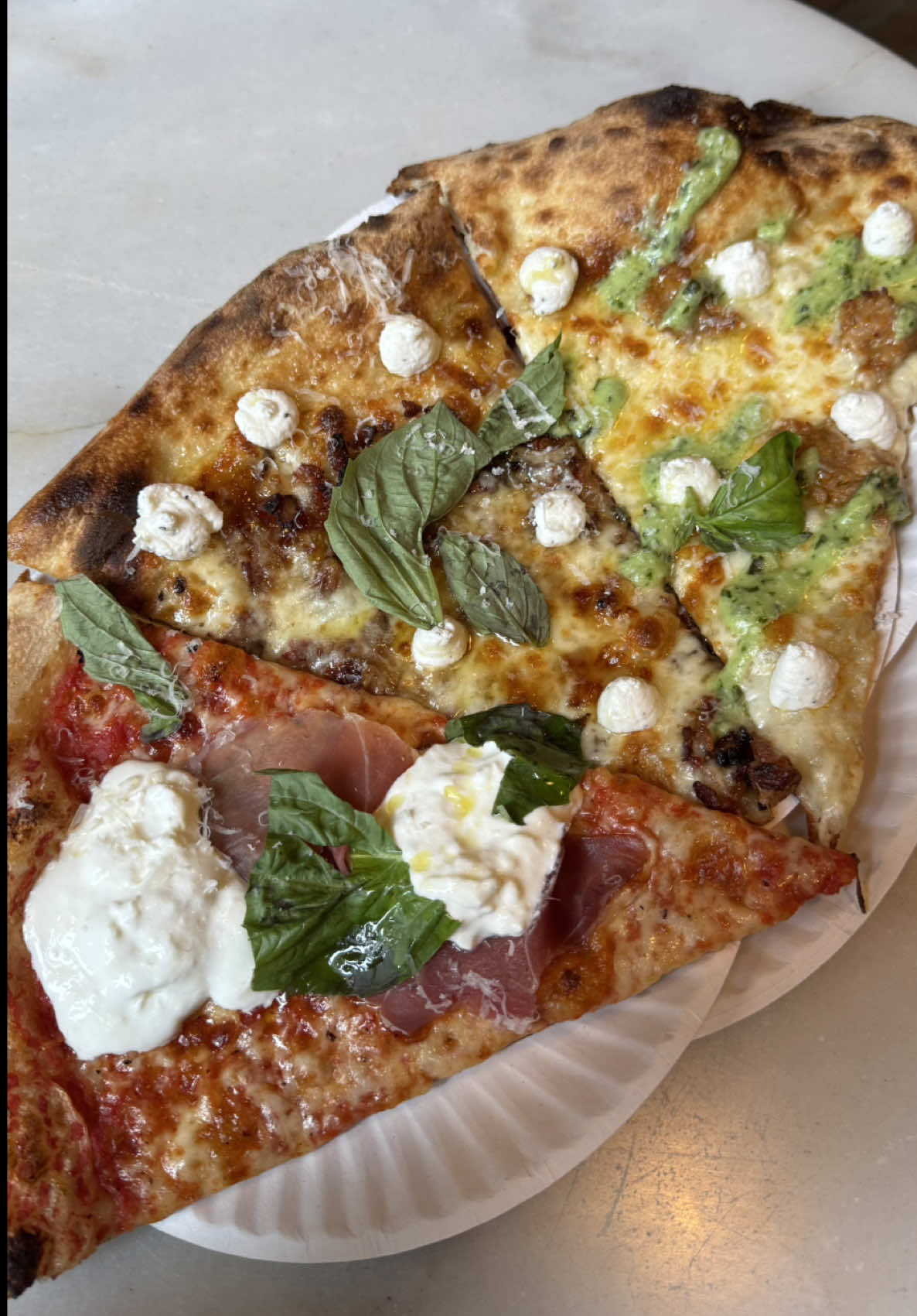 We walked over to this pizza spot in west village for lunch - she loves it & apparently it’s very popular (hence the line)  Cute little spot - we were lucky enough to get there first & grab a table.  Tried 3 slices in total:  Fig jam & bacon  Sausage & pesto  Prosciutto & burrata  Worth the hype (for me) & also the price was decent imo - $28 for 3 slices, a slice of cake, & tip  📍 L’industrie - West Village  #westvillage #travelvlog #nyc #nycpizza #nyceats 