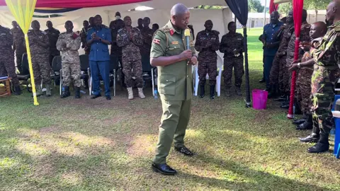 Gen.Henry Masiko UPDF JS political commissar leads personel of AOCC into singing revolutionary (Patriotic) song at the end of the one week ideological symposium at Airforce Headquarters 