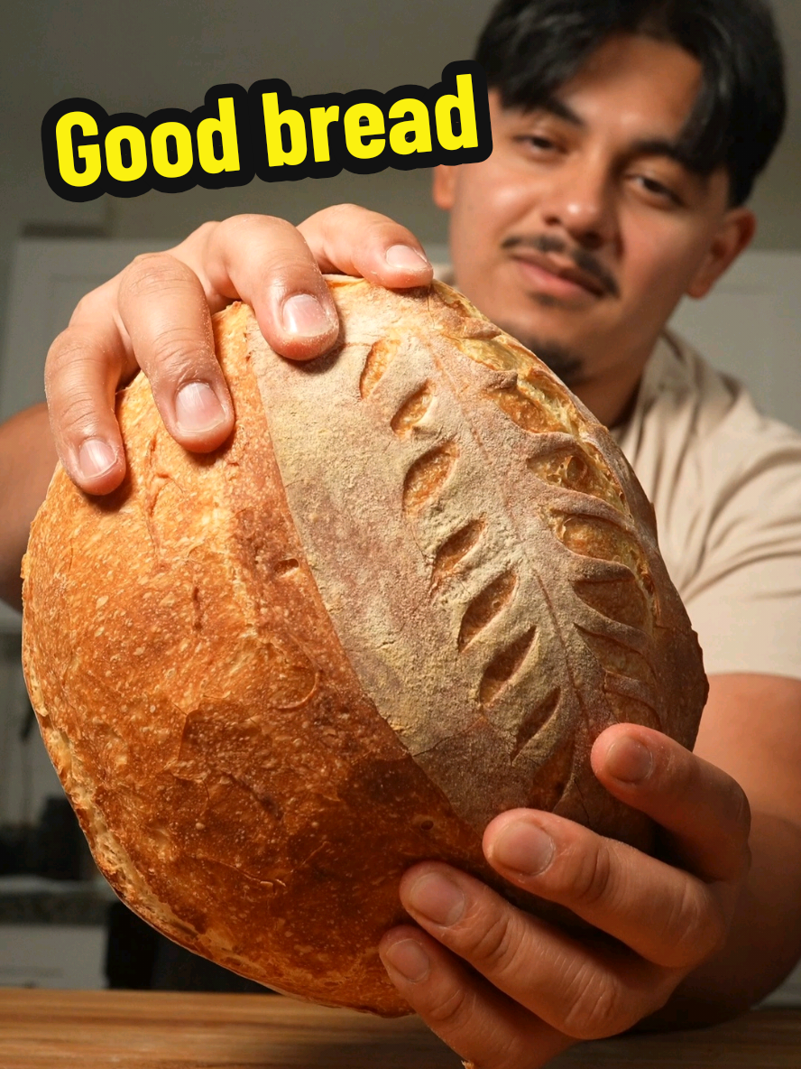 A great loaf isnt a good tasting bread, but a bread that's made from the heart! once you make this you may never buy from the store again, AND THAT OKAY!  #bread #baking  TIPS FOR A GREAT LOAF •have a pizza stone, this give the bottom a good crust! •Let bread cool 1 hr before slicing •have fun MOST IMPORTANTLY The recipe! 🔽 -500g Bread Flour -50g water, 2g yeast -10g ocean (SALT) -325g water  OVEN TEMP - 475F (246C) this type of dough is 75% hydration. 