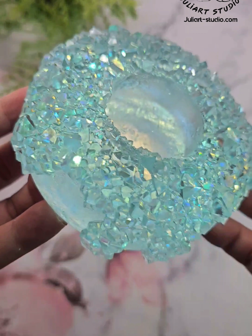 Capturing moments with this beauty and feeling a little bittersweet 🥺.  It's so pretty, I almost want to keep it! ✨️ But it's going to a good home today, so I'm happy.  Anyone else get attached to their creations? . Crystal Tealight Holder made with Silicone Mold on my website juliart-studio.com under Crystal Molds Collection. . #crystals #druzy #homedecor #resinmolds #resinmold #siliconemold #ringdish #SmallBusiness #resina #tealight #resinartist #resinmold #satisfying #demoldingvideo #demolding #resindemolding #irredescent #rainbow  #shopsmall 