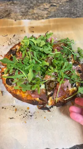 #pizza #homemadefood #truffle #brie #tiktokfood #italian Easy homemade Brie Truffle mushroom and prosciutto pizza with hot honey and arugula. 