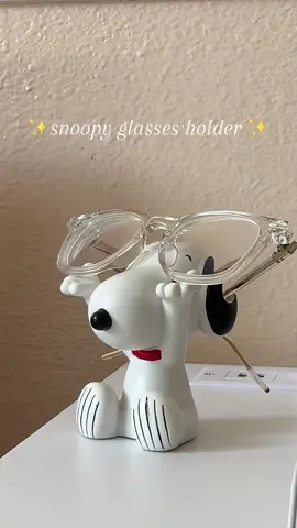 I always lose my glasses in the morning so my bf got snoopy to help me out 🥹🙌🏼🫶🏼  UPDATE: Okokok sooo after an extensive deep dive, this Snoopy glasses holder is actually a vintage collectors item so it’s quite hard to find 🥲 it’s hand painted and very lightweight and also has a hole in the back to hold your microfiber cloth ! It was purchased through a third party seller (Mercari) and I’ve seen it on a couple other sites as well such as eBay and poshmark!  They’re all mainly shipped from Japan. Made out of Resin, Polyethylene, Calcium Carbonate and the brand is Westland Giftware hope this helps 🥰🫶🏼 #snoopy #glassesholder 