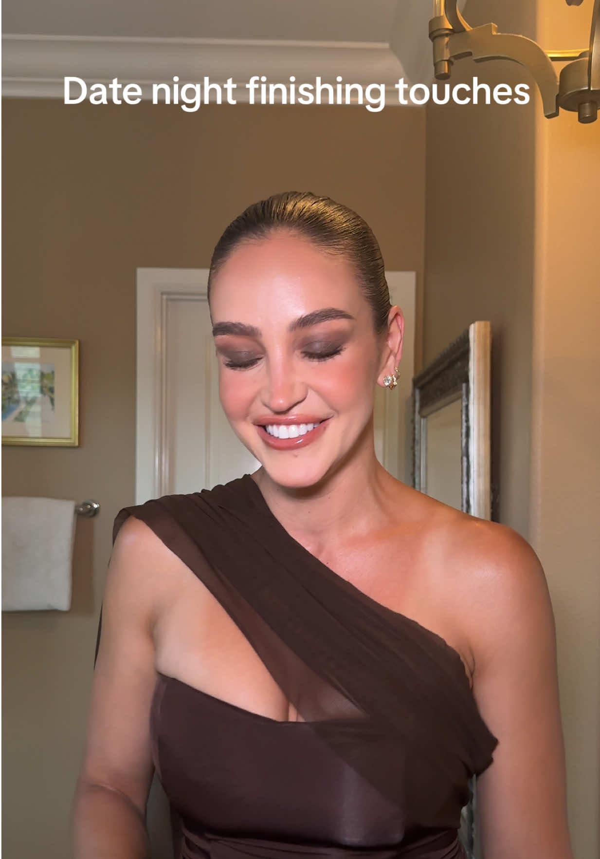 Date night finishing touches! Dress is @Meshki “Mattea” body glow @Refy Cosmetics #datenight 