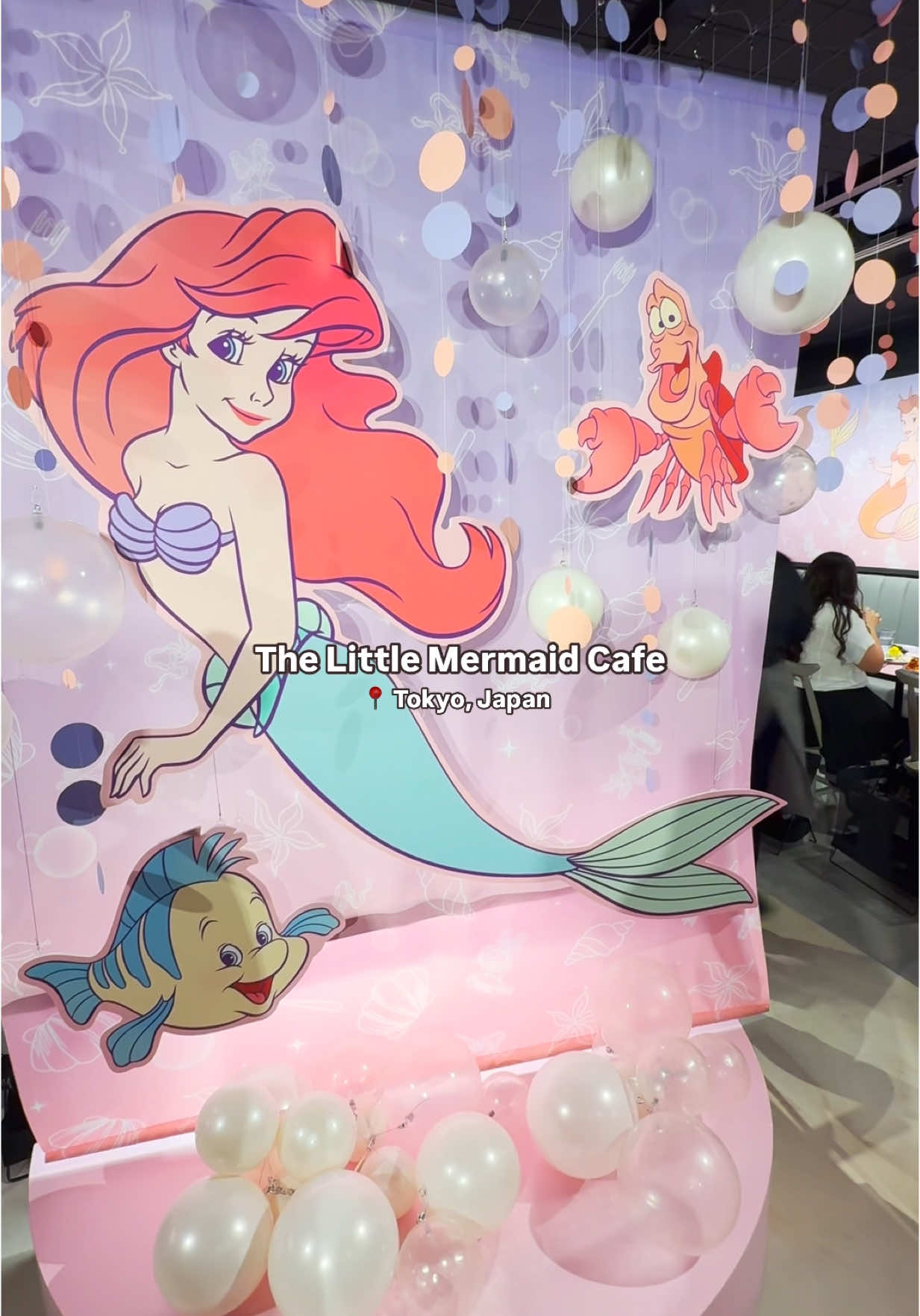 Calling all Little Mermaid fans! 🧜‍♀️💖✨ Did you know that there’s a little mermaid themed cafe in Omotesando Hills? Located right near Harajuku in Tokyo, this cafe is a must visit!  Here’s what food I ordered (can confirm it was all delicious): 🍝 Neapolitan Pasta with Blue Ribbon and Flounder’s Mashed Potatoes 🐚 Shell Fruit Yoghurt 💜 Ursula’s Blueberry Style Smoothie Skip the queue and book ahead, plus bookings also receive a special gift on arrival 🎁  Don’t miss out, the Little Mermaid Cafe leaves Tokyo on June 8th! 💜 #ohmycafe #thelittlemermaid #thelittlemermaidcafe #tokyo #tokyocafe #japan #japantiktok #japanfood 