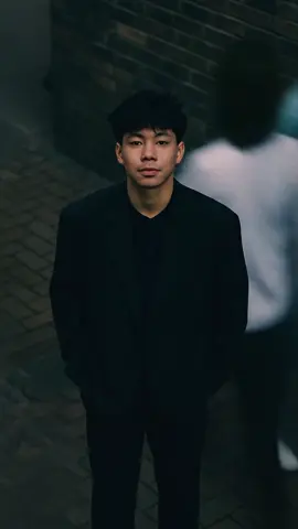 Cinematic overhead shot of me standing still on a brick city sidewalk, wearing [clothes from photo]. + Blurry crowds rushing around me. Gloomy lighting, 35mm film style, 11k shallow depth of field, sharp focus on me. Portrait aspect ratio 3:4. #chatgpt #aigenerated 