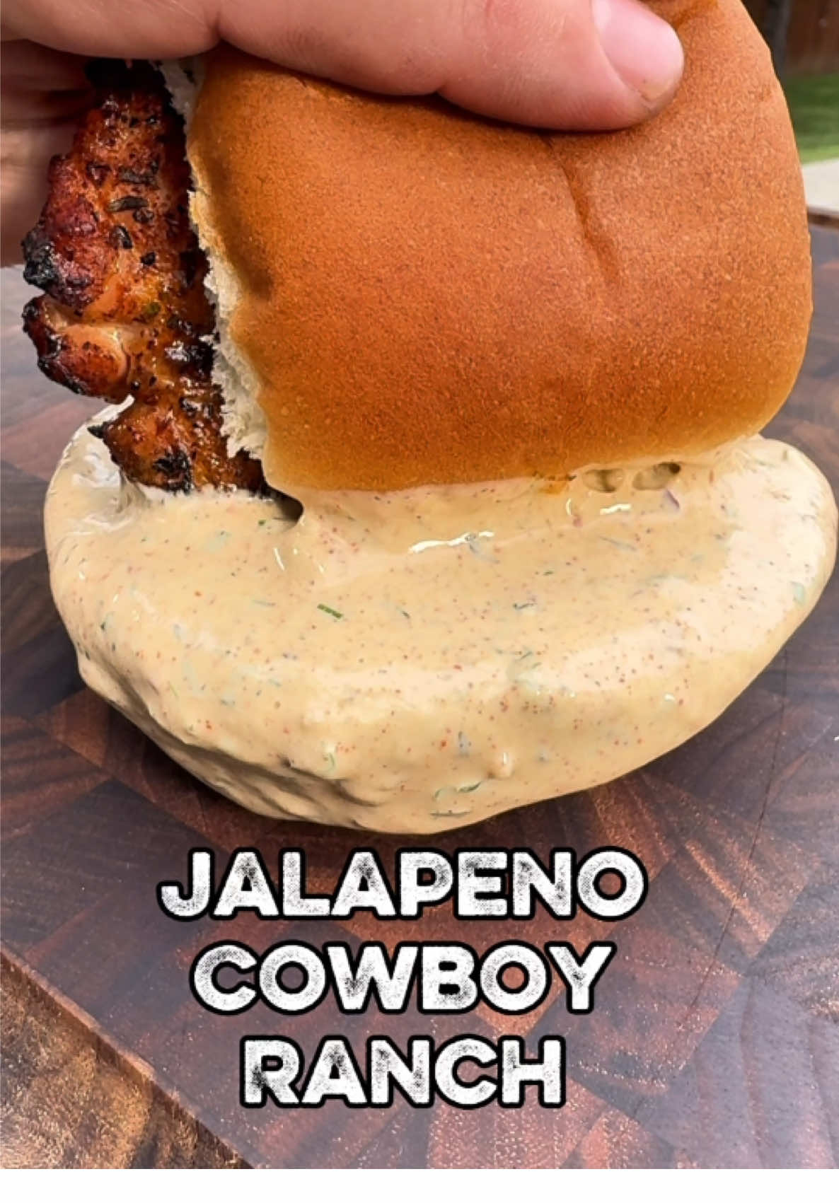 🌶️ Jalapeno Cowboy Ranch – My New Secret Sauce Hack! 🤠🔥   I leveled up my viral Cowboy Ranch with a jalapeno twist, but here’s the move: Freeze your jalapeno, then microplane it into the ranch. No big chunks—just pure, even jalapeno flavor and heat in every bite. This is the BEST ranch I’ve ever made.   And you know I had to put it to the test, so I grilled up some chicken thighs on the @Hasty Bake to make a simple and delicious sandwich and dunked it in the Jalapeno Cowboy Ranch. Next level!   Jalapeno Cowboy Ranch Recipe: • ½ cup mayo • ¼ cup buttermilk (adjust for consistency) • ¼ cup sour cream • 4 cloves garlic, minced • 1 tbsp Dijon mustard • 1 tbsp fresh parsley • 1 tbsp fresh dill • 1 tsp chives • 1 tsp thyme • 1 tsp paprika • ½ tsp cayenne • ½ tsp crushed red pepper flakes • ½ large jalapeno, frozen and microplaned • Salt & pepper to taste   Mix, chill, and put this on everything—wings, fries, sandwiches, you name it.  🔥 Creamy, herby, with a kick from the jalapeno—no chunks, just that perfect ranch heat.   💬 Comment “RANCH” if you want to try this trick—and share with someone who’s always down for spicy ranch!   #CowboyRanch #JalapenoRanch #RanchRecipe #SauceTok #DipRecipe #HomemadeRanch #SpicyRanch