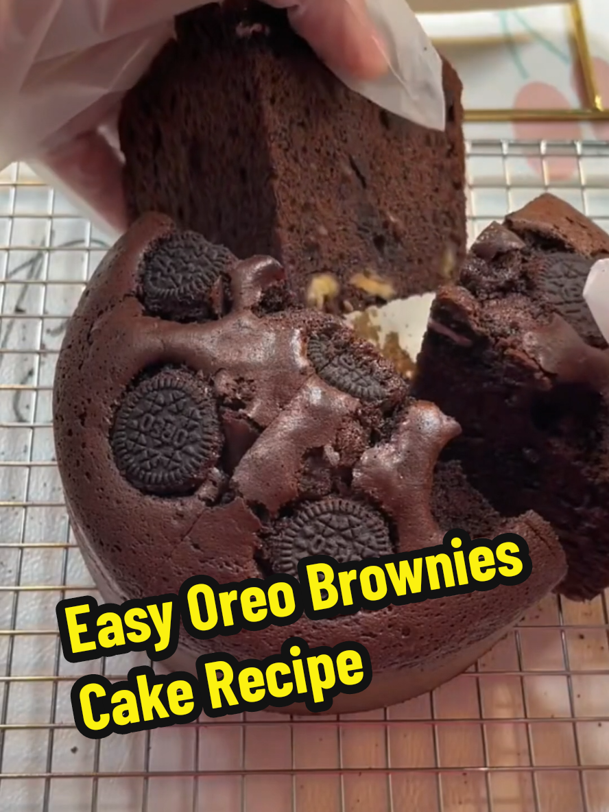 Easy Oreo Brownies Cake Recipe👇  👉Ingredients: Dark chocolate: 4 ounces (about 115 grams) Butter: 5 tablespoons (about 70 grams) Large eggs (room temperature): 3 (about 195 grams with shell) Granulated sugar: 1/2 cup (100 grams) All-purpose flour: 1/4 cup (35 grams) Unsweetened cocoa powder: 2 tablespoons (10 grams) Baking powder: 1/2 teaspoon (1.5 grams) Chopped walnuts: 1/3 cup (50 grams) Crushed Oreo cookies: 3 tablespoons (20 grams) plus a few more for topping Parchment paper for lining Instructions: Melt the dark chocolate and butter together in a heatproof bowl over simmering water until smooth and silky. Set aside to cool slightly. In a mixing bowl, combine the eggs and sugar. Using an electric mixer, start on low speed until just combined, then increase to high speed. Beat until the mixture is fluffy, pale, and roughly tripled in volume. To check, lift the beater and form a figure eight in the batter; if the pattern slowly fades after counting to five, it’s ready. Slowly fold the melted chocolate mixture into the egg mixture, blending gently but thoroughly. Sift together the flour, cocoa powder, and baking powder. Gently fold the dry ingredients into the wet batter until just combined. Stir in the chopped walnuts and crushed Oreo cookies carefully to keep the batter airy. Prepare a six-inch round cake pan by lining it with parchment paper. Pour the batter in and tap the pan lightly a few times to release large air bubbles. Sprinkle a few crushed Oreos on top for decoration. Bake in a preheated oven at 350 degrees Fahrenheit (about 180 degrees Celsius) on the lower rack for approximately 40 minutes. Once baked, gently shake the pan to release steam. When cool enough to handle, remove the cake from the pan and peel away the parchment paper to let it cool completely. Enjoy! Indulge in the rich chocolate flavor balanced by the crunch of Oreos and walnuts in this decadent, moist brownie. #creatorsearchinsights #Recipe #EasyRecipe #cake #chocolate #brownies #oreo #baking #fyp 