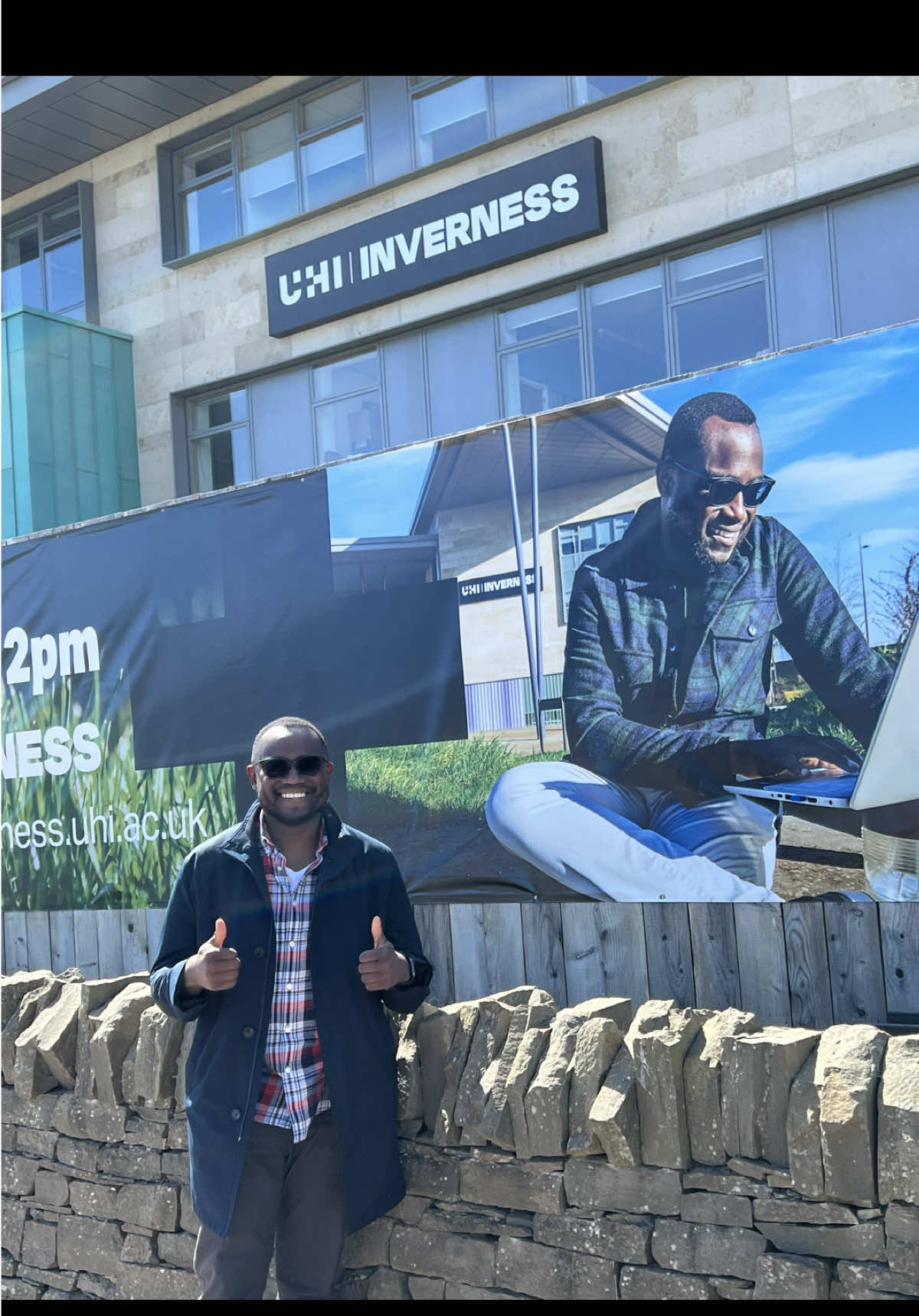 A little surreal. Spotted my face on the school billboard last week. Grateful to be part of this. #frjamesanyaegbu #frjamesa #faithchatplatform #tiktokpriest #fyp #catholictiktok #christiantiktok #uhiinverness 