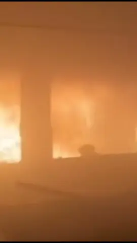 Footage has emerged from Gaza that purportedly shows a young Palestinian girl attempting to escape a fire produced by an Israeli airstrike on a school being used as a shelter. The strike killed is reported to have killed 36 people 18 of which were children.