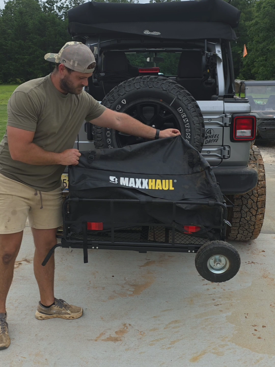 this thing has become a must on our trips. we use it for luggage when traveling. we also use it to bring groceries to our room when we are on vacation. the waterproof cover makes traveling in the rain stress free.  #luggagerack #travelideas #travelfinds #travelhacks @Morgan Winton 