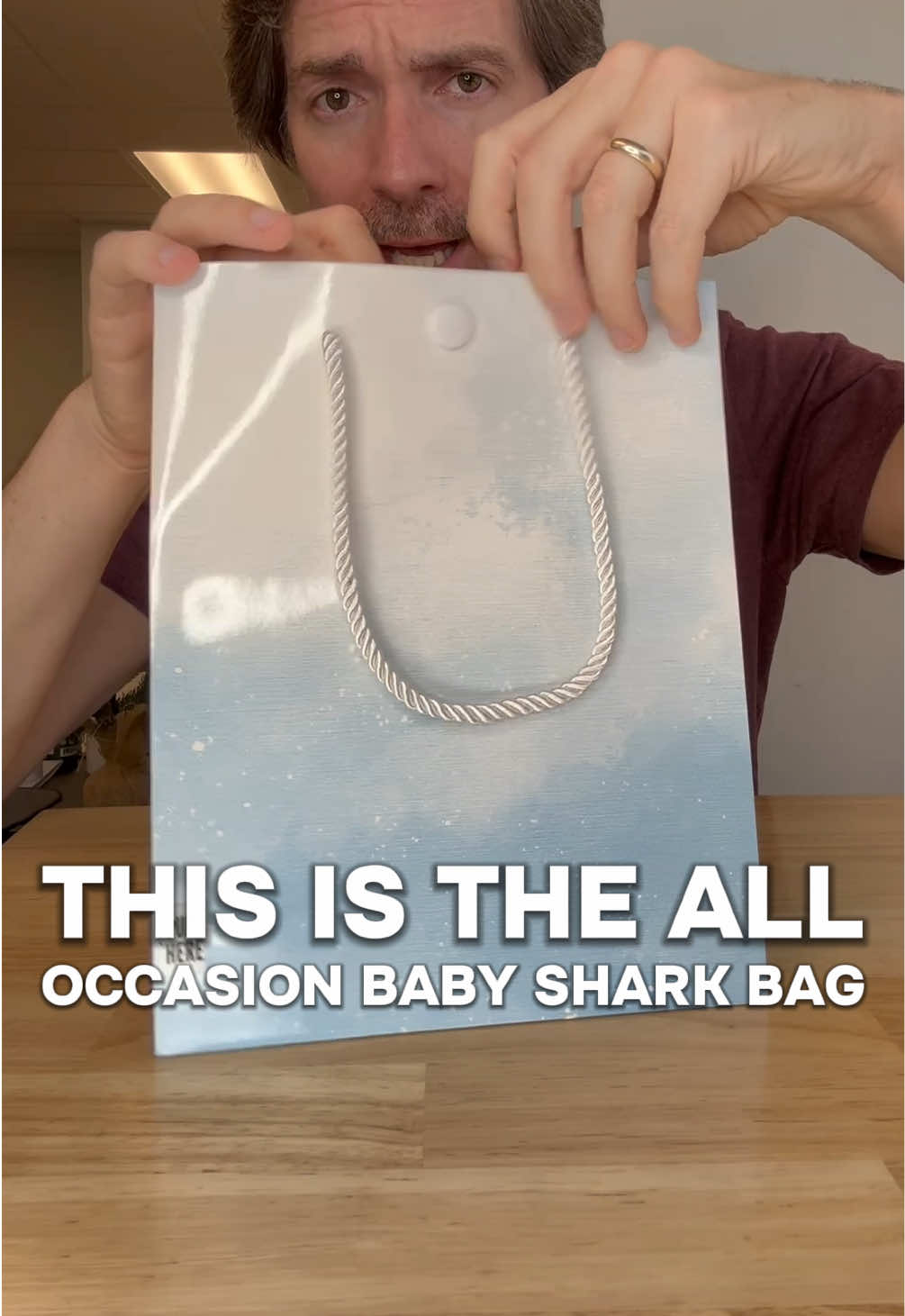 Sings our baby shark song! The daddy shark is much better too! 