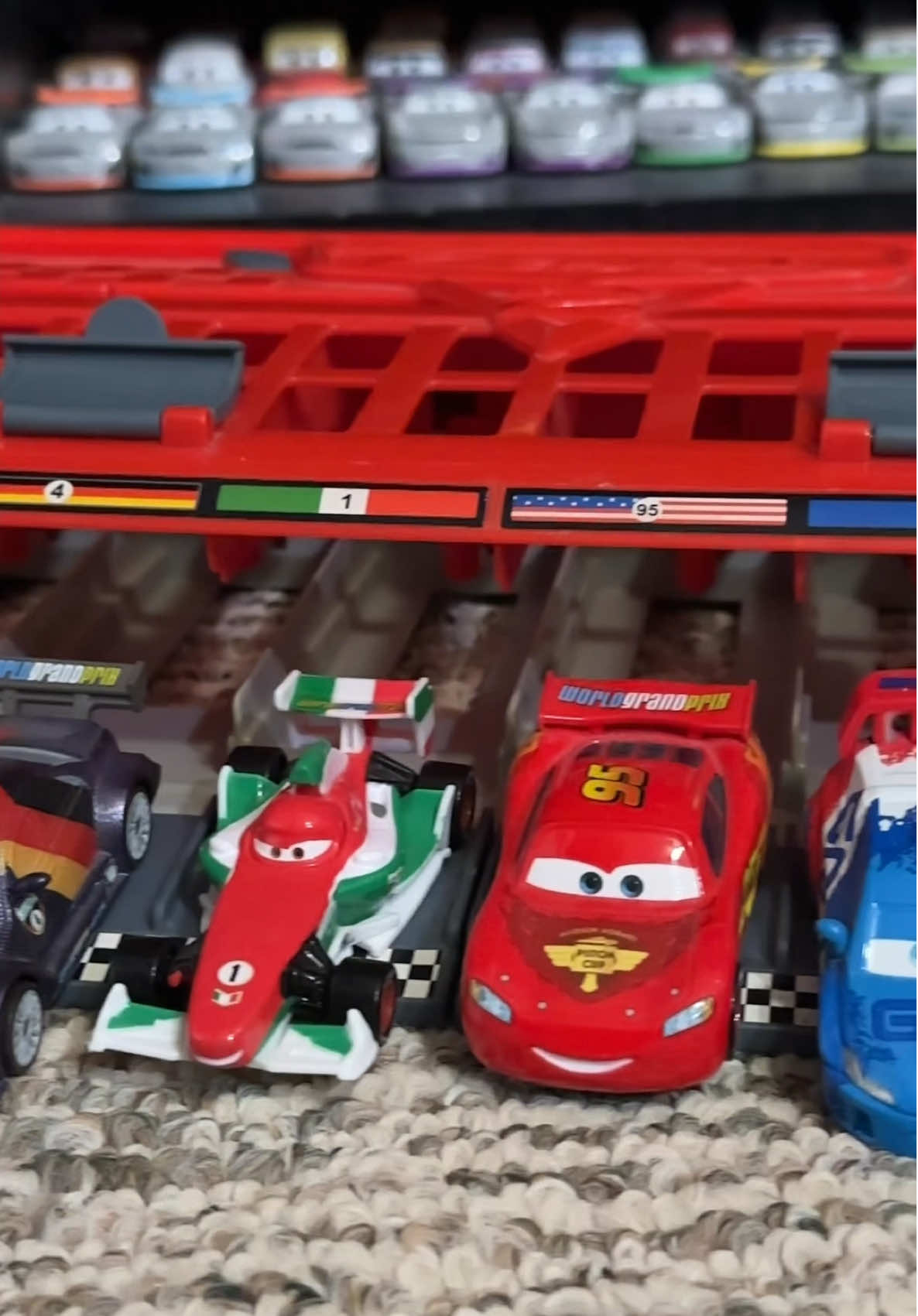 One of the coolest ways to store and race all your World Grand Prix racers.. except for one 🙋🏻 Did you have this launcher growing up? 🌎⚡️ #disneycars #lightningmcqueen #fyp #radiatorsprings #kachow #carsmovie #pixar #hotwheels #collection #carsland #cars #carsoftiktok 