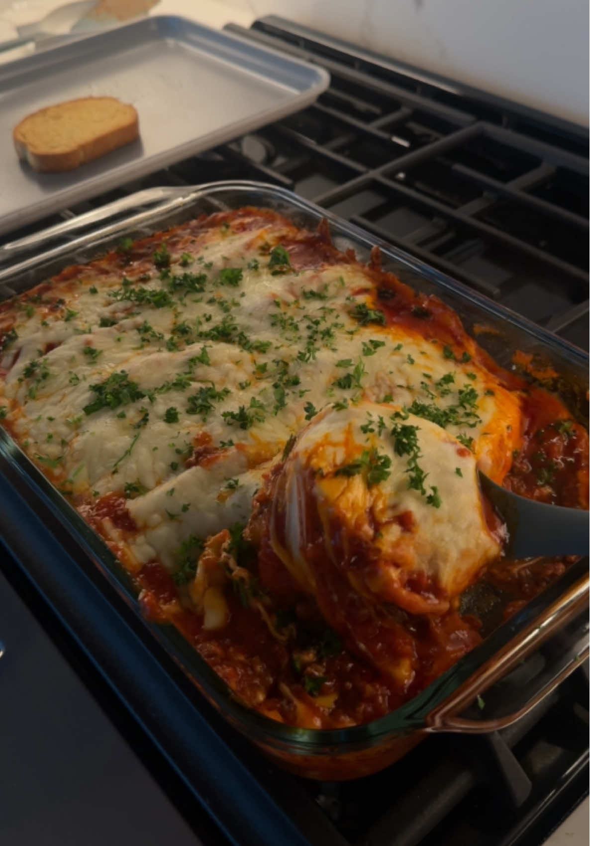 🍝 stuffed jumbo pasta shells recipe:  ingredients: - ricotta cheese - spinach - parsley  - mozzarella - marinara  - ground beef - jumbo pasta shell - an egg - taco seasoning  - salt, pepper, and onion powder - yellow onion directions: - preheat oven to 380 degrees fahrenheit  - dice & then sautee onions in pan on medium high heat - add ground beef - once almost fully cooked, add taco seasoning  - bowl water and add jumbo pasta shells (cook for 9 minutes) - add in a container of marinara sauce to ground beef and let cook  - mix together ricotta (15 oz), an egg, salt, pepper, onion powder and chopped up spinach in a bowl for filling - in a baking dish, put in cooked ground beef + marinara as a base  - fill jumbo shells with ricotta filling - place stuffed shells side by side in baking dish till full - add another container of marinara on top of it all - cover baking dish in mozzarella (I used 1 1/2 bags)  - (I forgot this step in video, but cover baking dish with aluminum foil) - bake for 40 minutes  - take out of oven & remove foil - bake for an additional 5 minutes  - enjoy!!! 