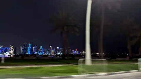Doha skyline at night hits different. #doha #qatar #corniche #nightdrive #drives #📸   billieeilish #hmhas #concert #tour#  #singer #singing #wildflower #fyp#viral #foryou #videos #night #
